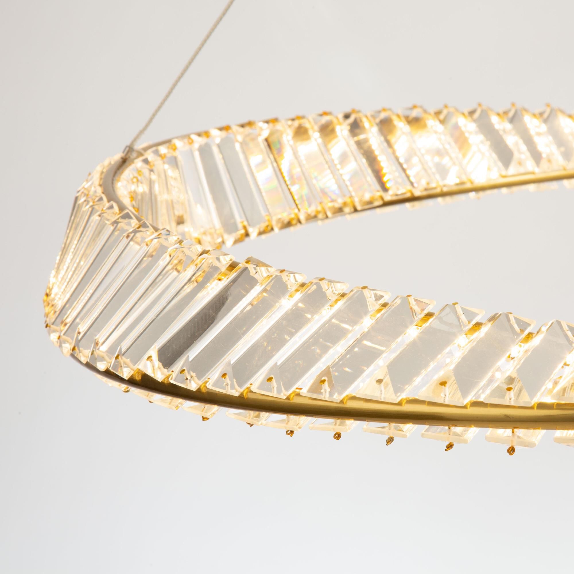 Shown in Brushed Brass finish and Clear Crystal glass