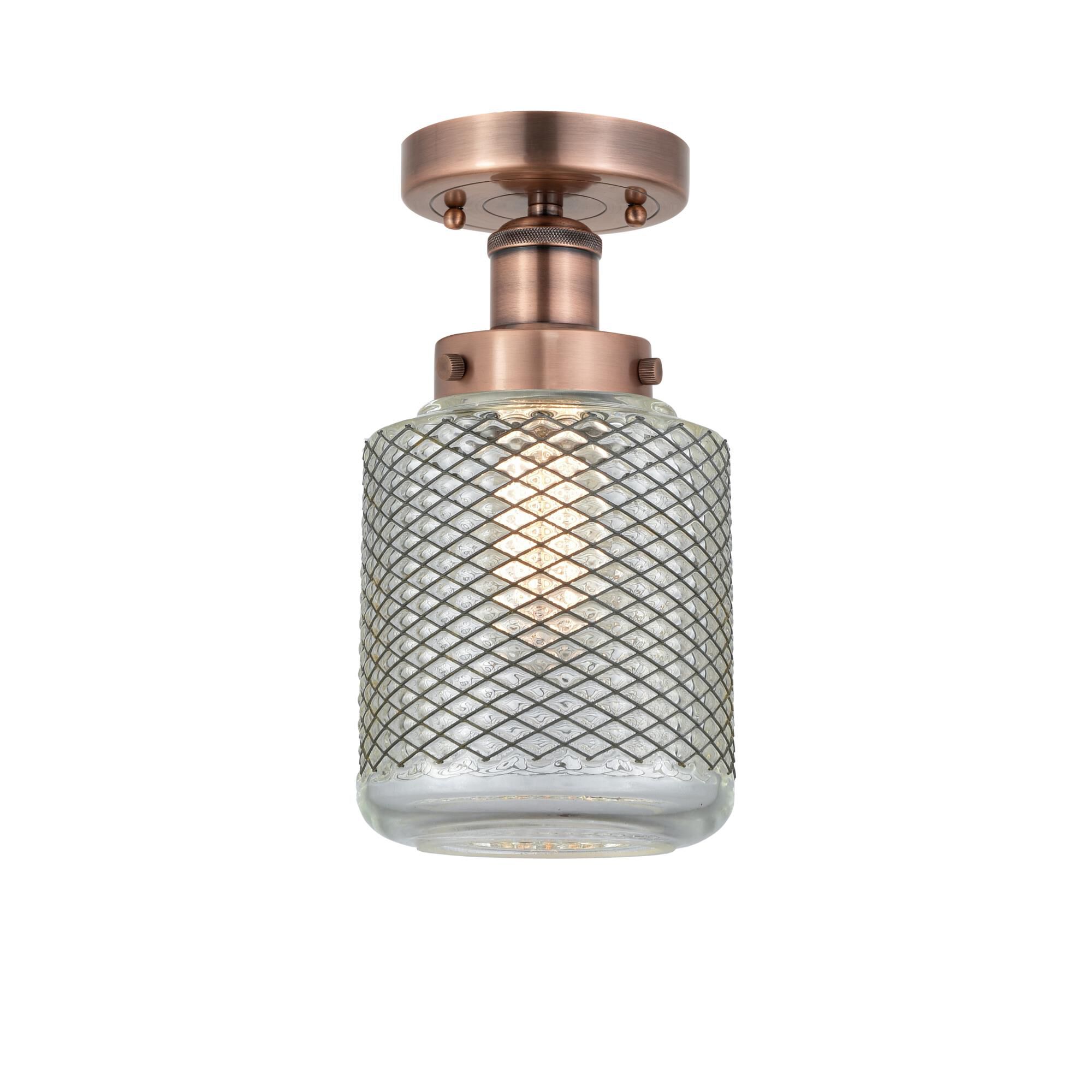 Shown in Antique Copper finish and Clear Wire Mesh glass