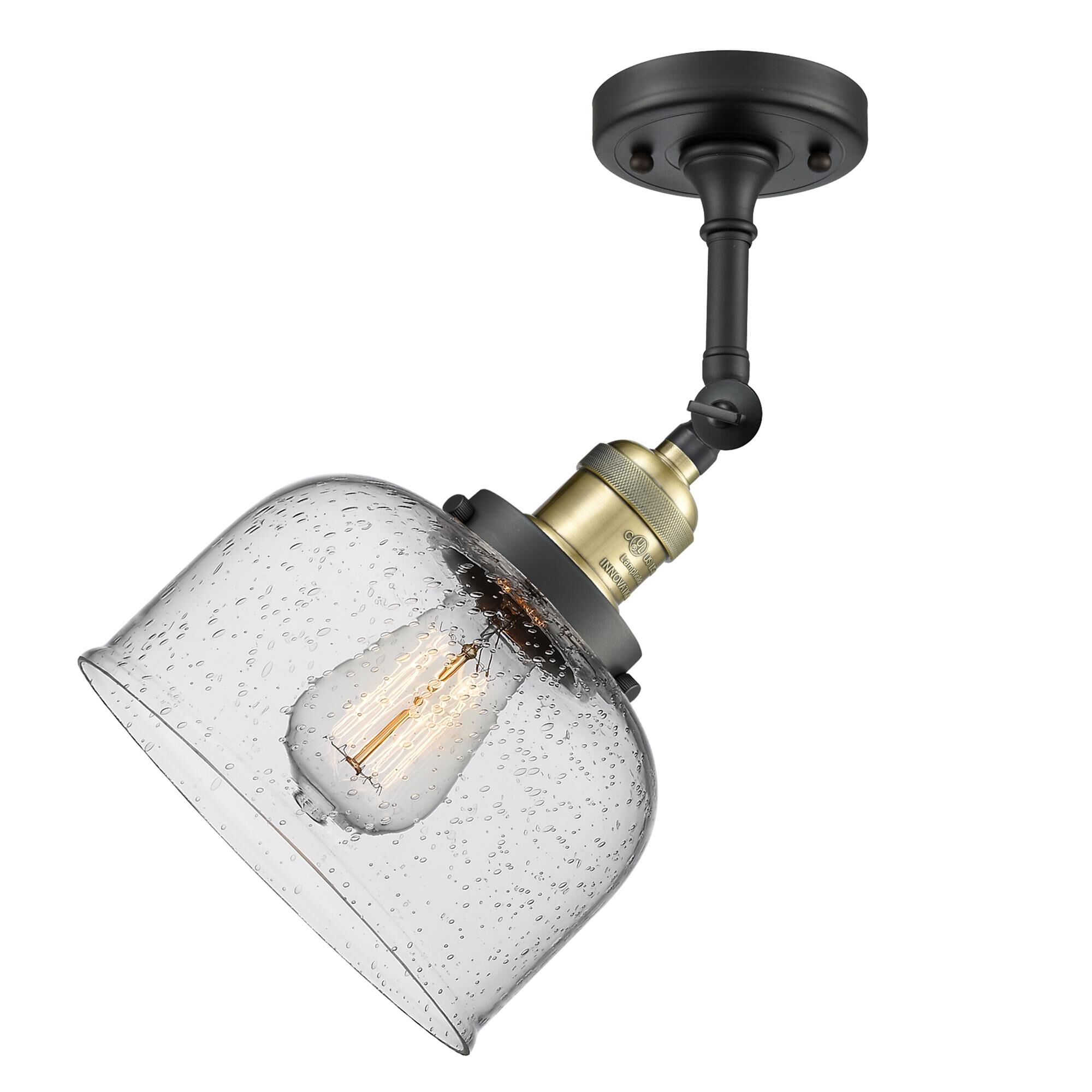 Shown in Black Antique Brass finish and Seedy glass