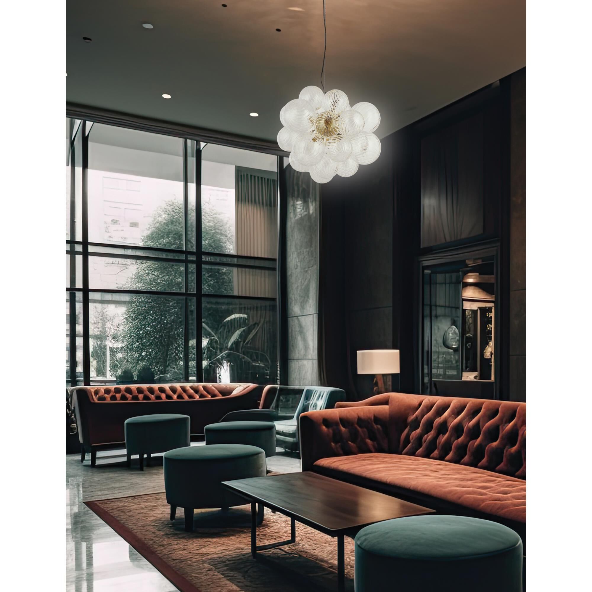 Shown in Aged Brass finish and Clear glass