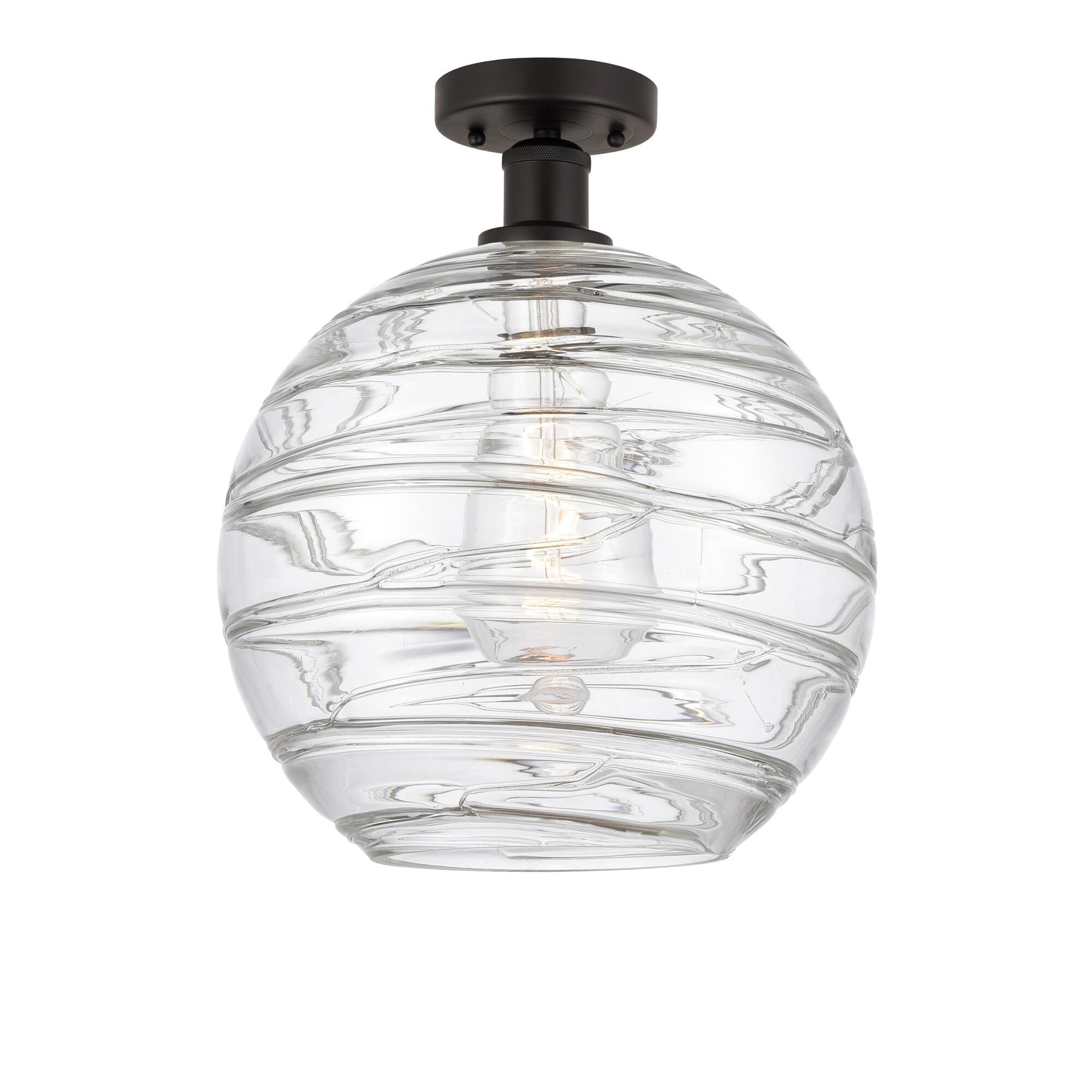 Shown in Oil Rubbed Bronze finish and Clear Deco Swirl glass