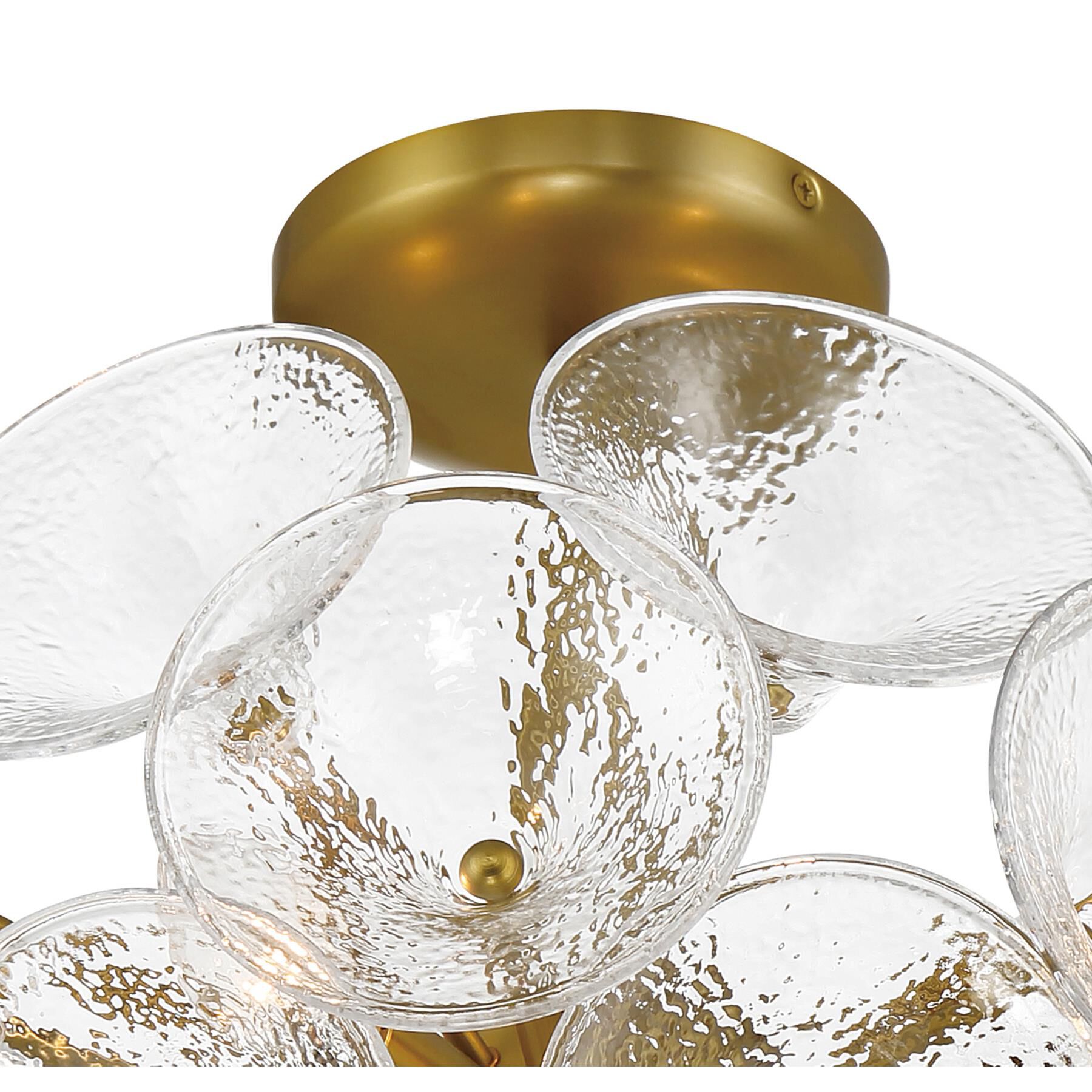 Shown in Soft Brass finish and Textured Clear Fluted glass