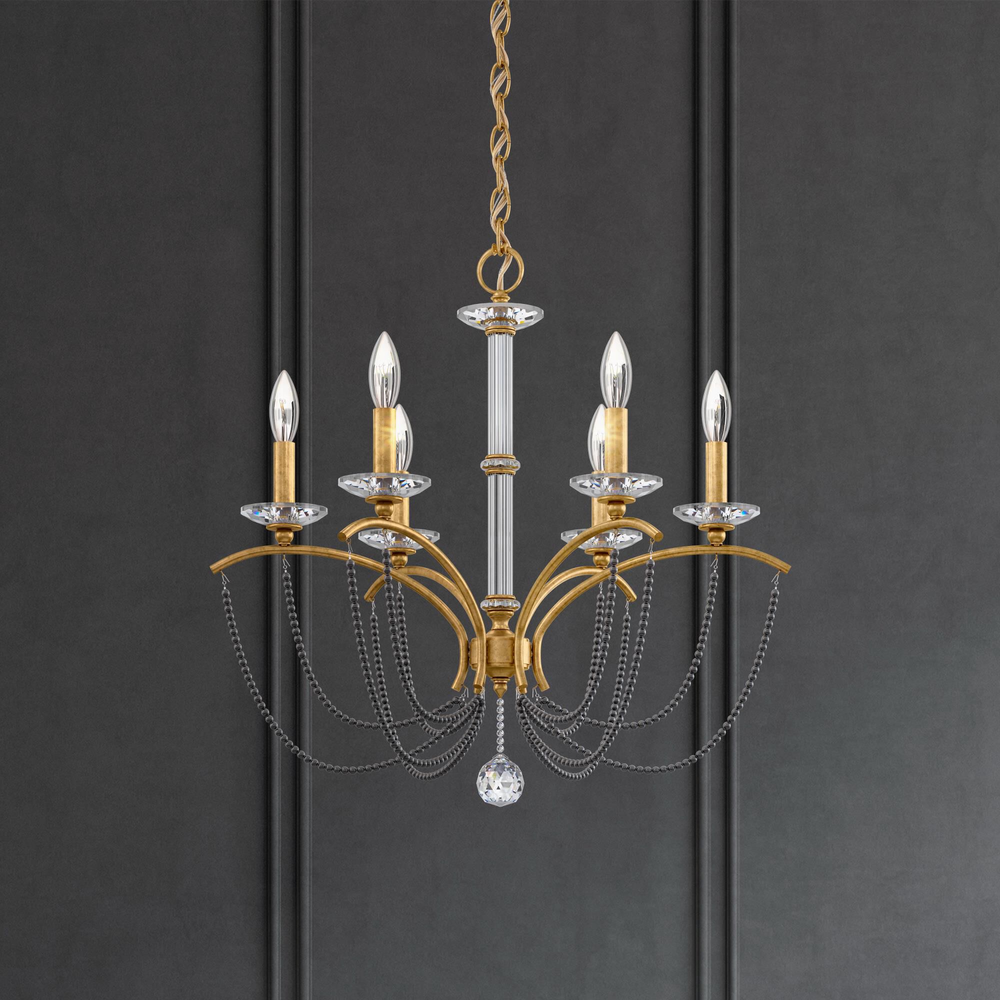 Shown in Heirloom Gold finish and Dark Grey Pearl crystal