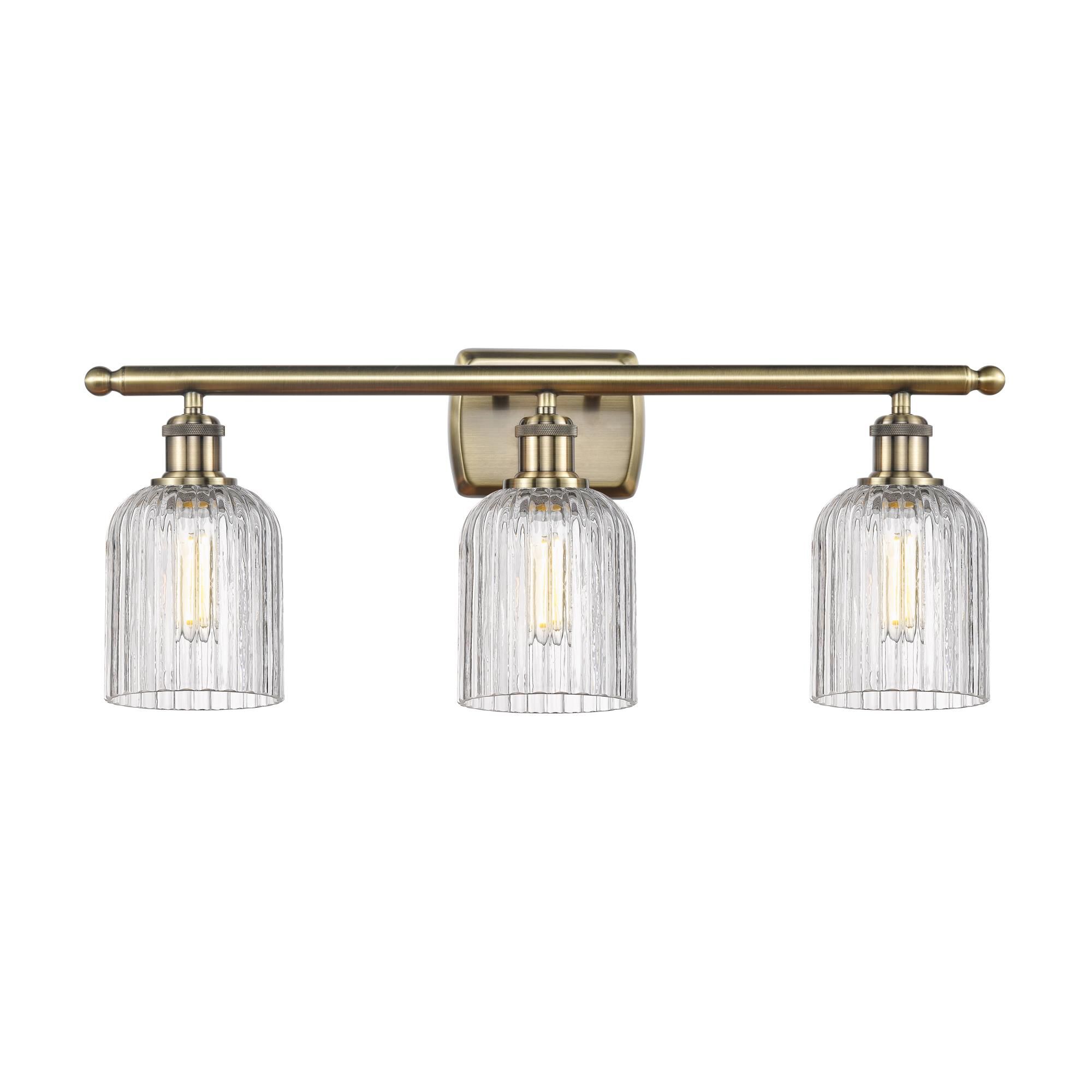 Shown in Antique Brass finish and Clear glass