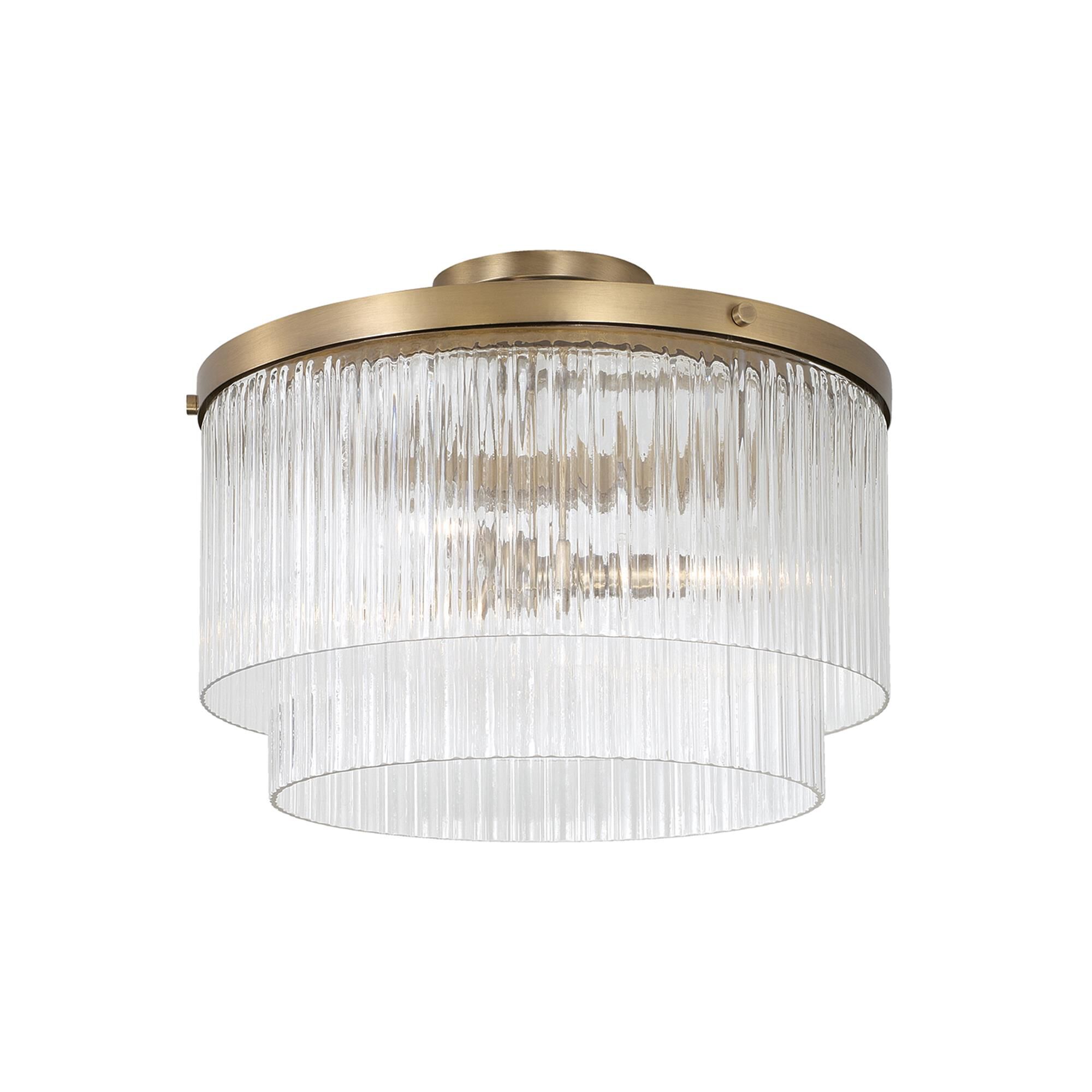 Shown in Aged Brass finish and Beveled Fluted glass