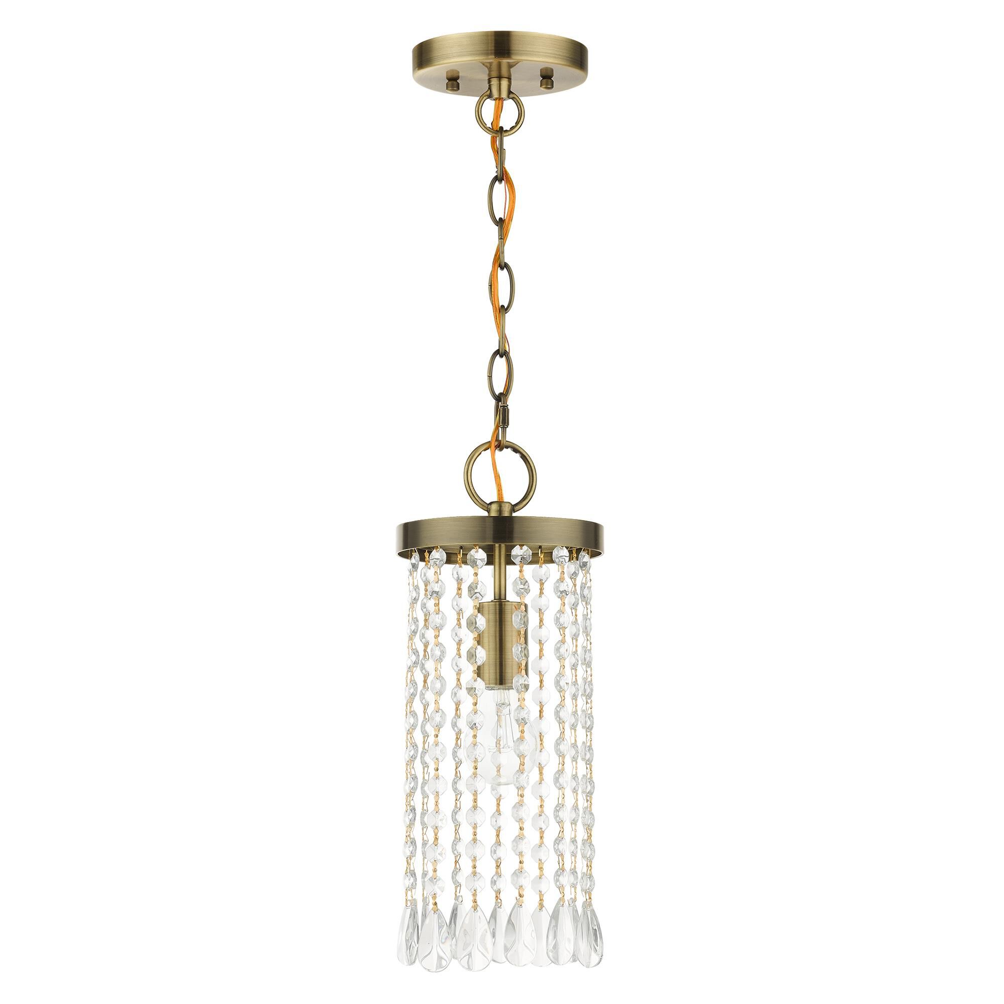 Shown in Antique Brass finish and Hand Assembled Crystal Shade glass