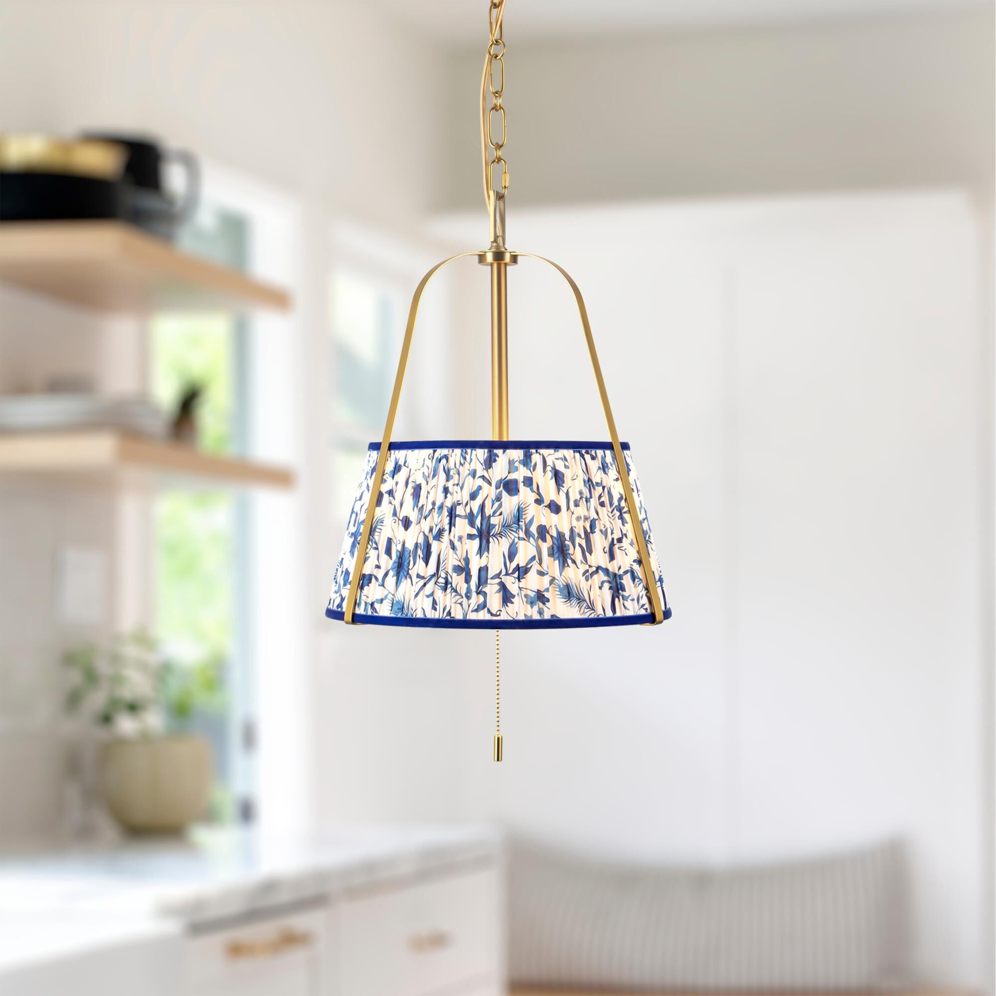 Shown in Brushed Gold finish and Blue Linen shade