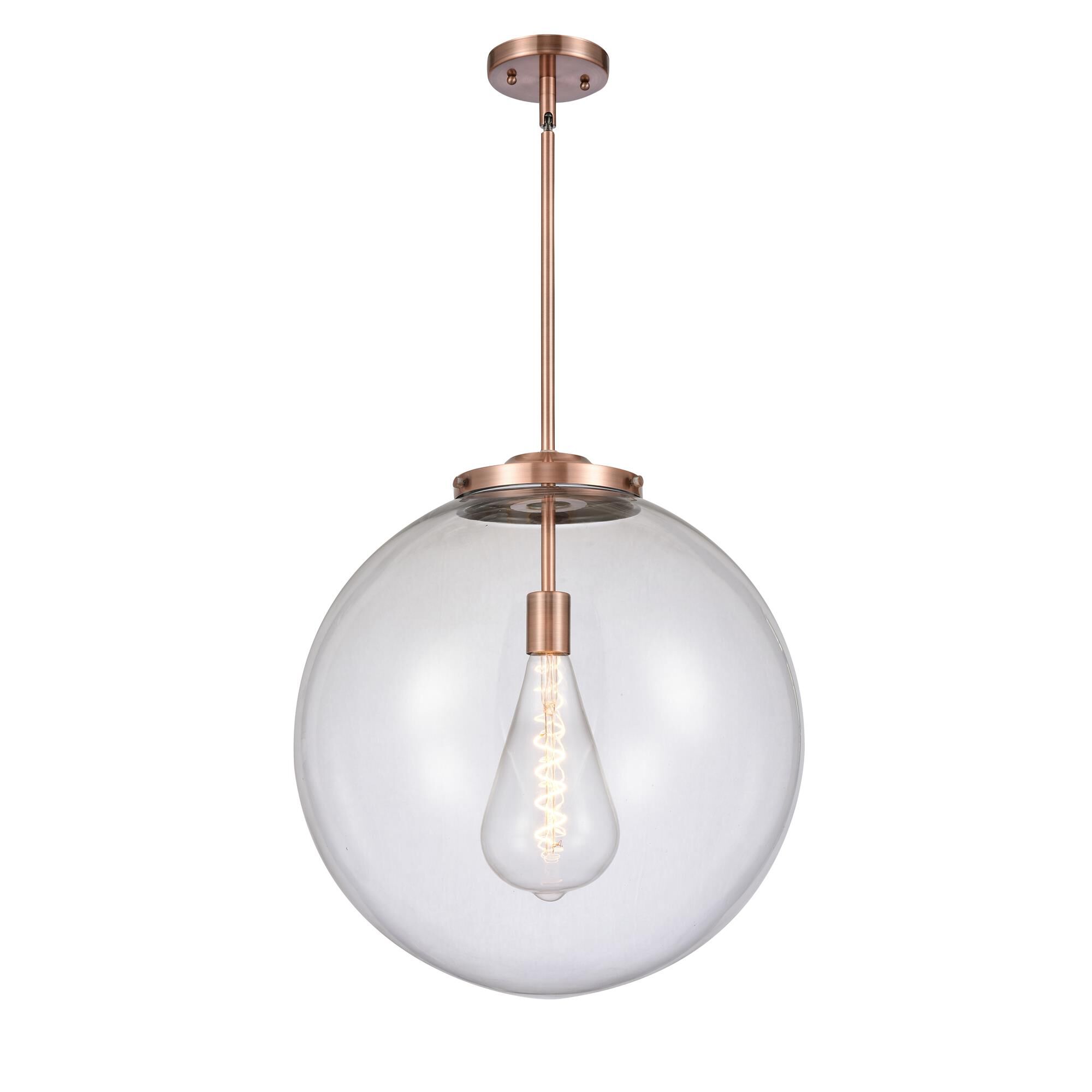 Shown in Antique Copper finish and Clear Beacon glass