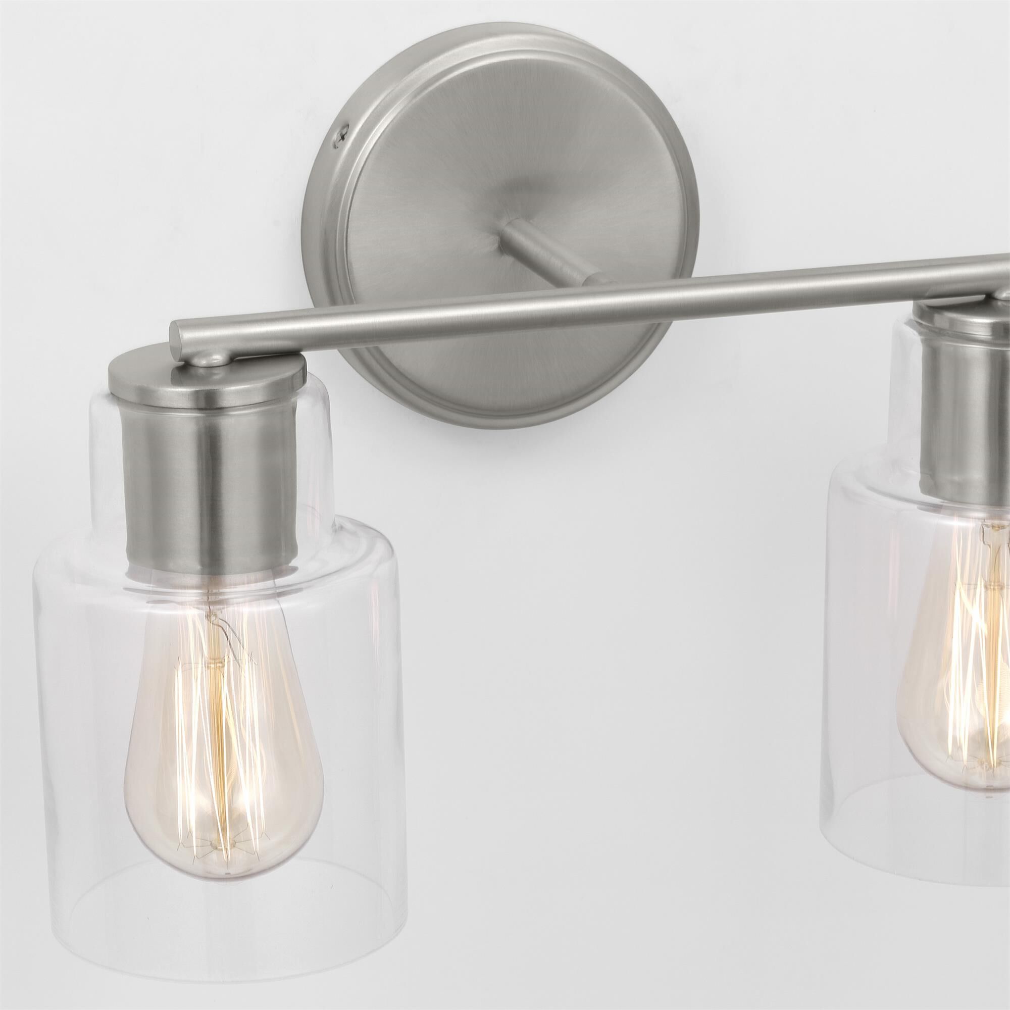 Shown in Brushed Steel finish and Clear Glass s shade