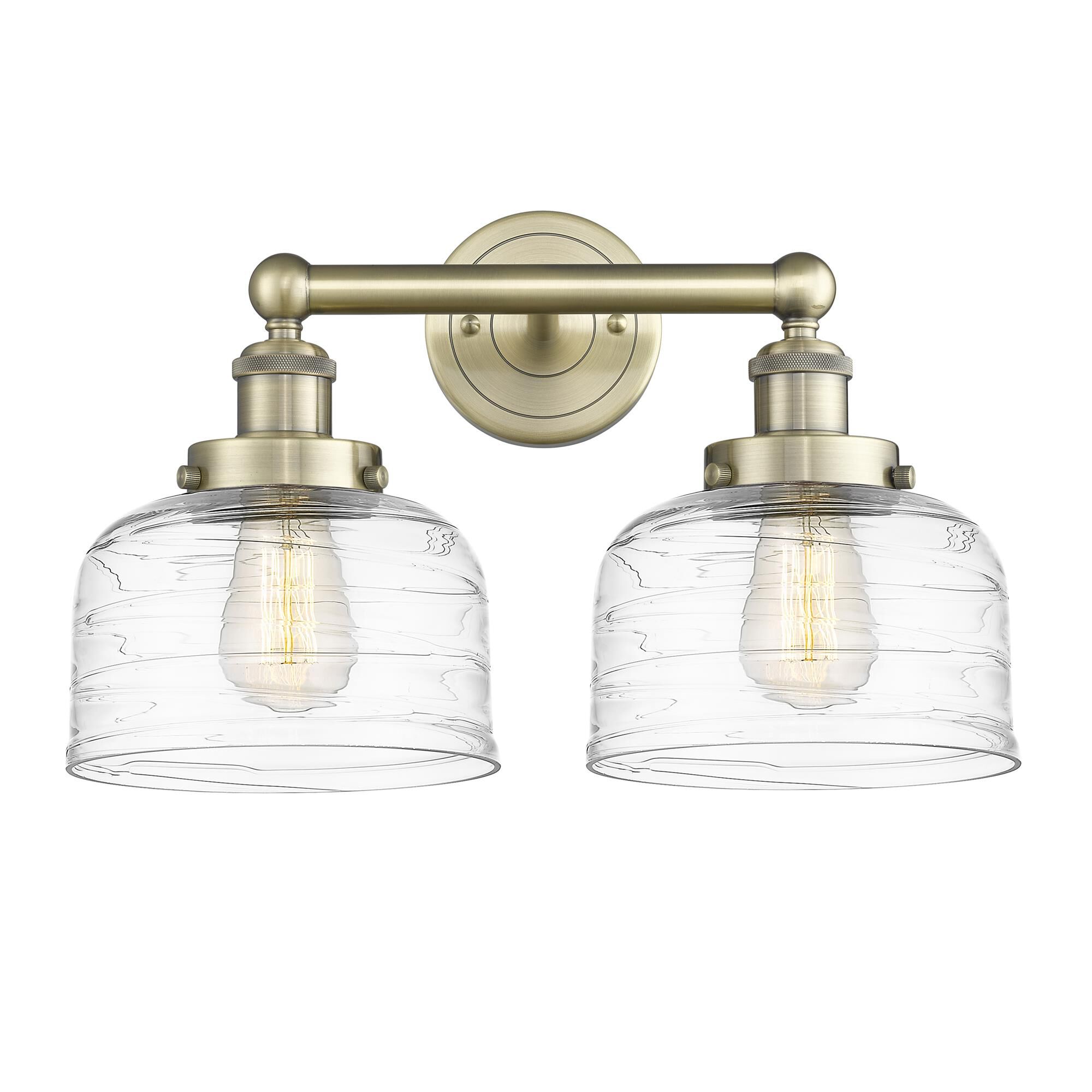 Shown in Antique Brass finish and Clear Deco Swirl glass