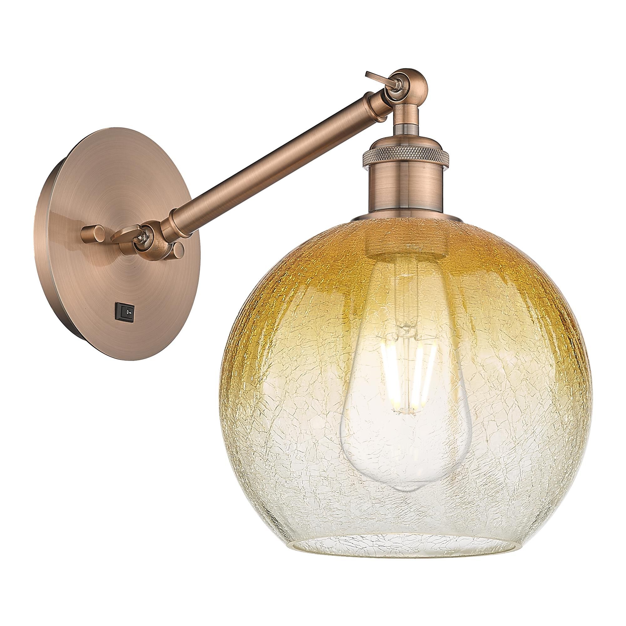 Shown in Antique Copper finish and Amber glass