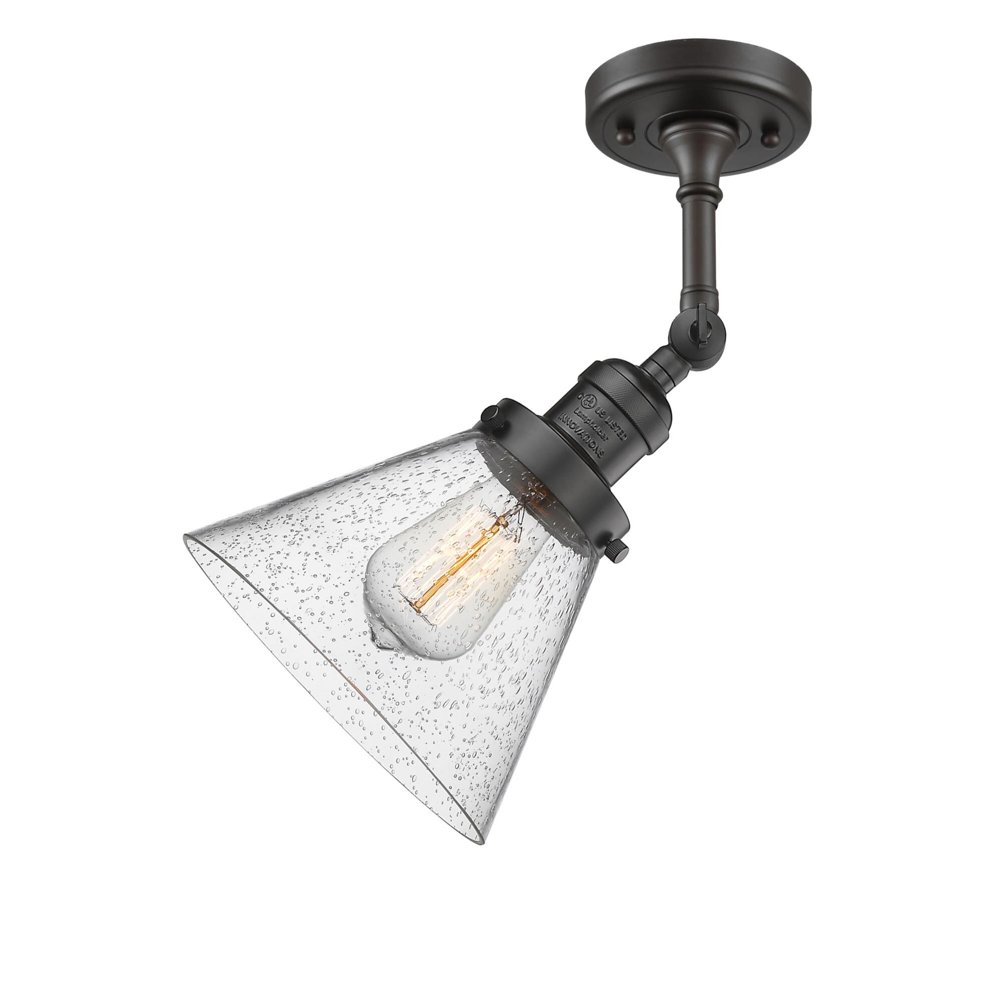 Shown in Oil Rubbed Bronze finish and Seedy glass and None accent