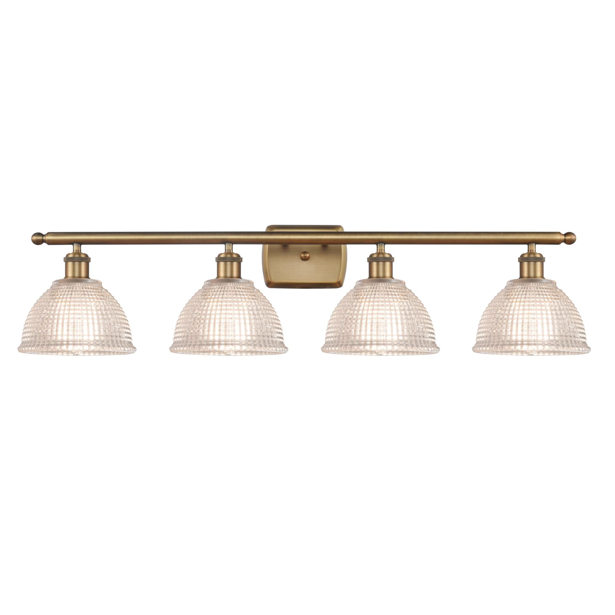 Shown in Brushed Brass finish and Clear Arietta glass and Polished Chrome accent
