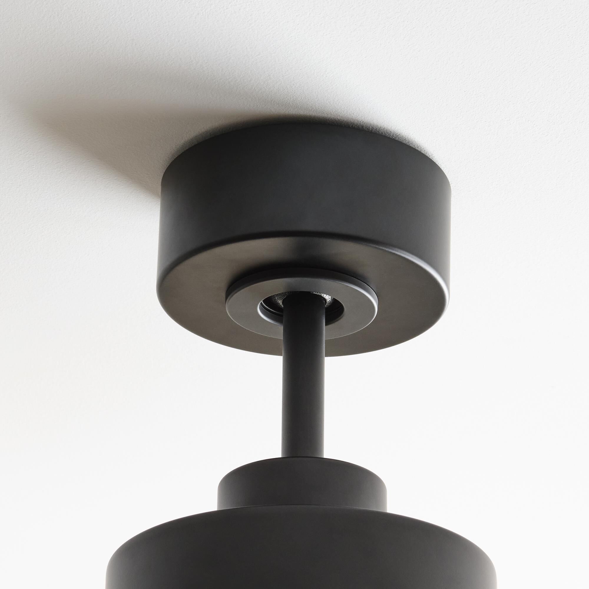 Shown in Midnight Black finish and Frosted Acrylic Diffuser shade