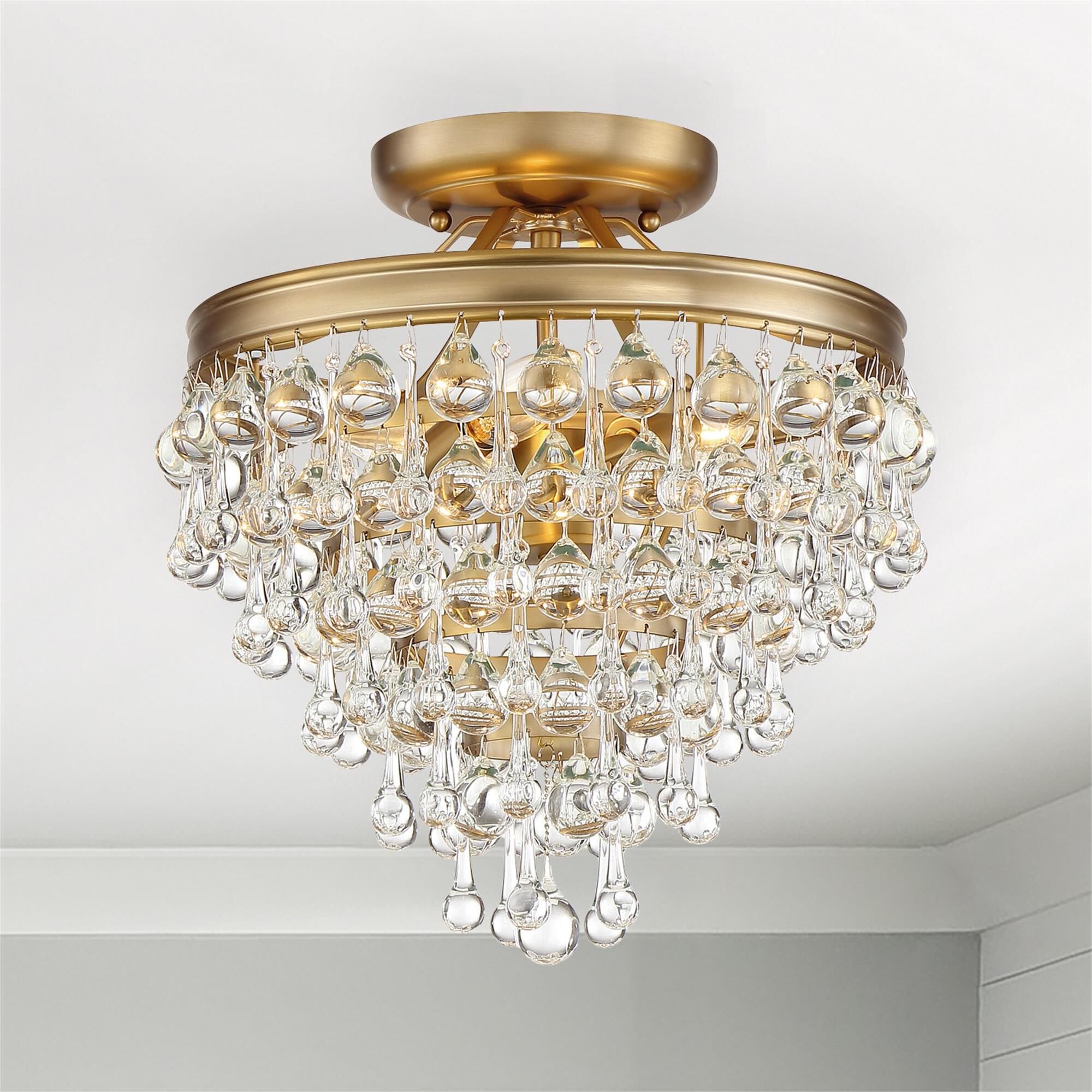 Shown in Vibrant Gold finish and Clear Glass Drops crystal