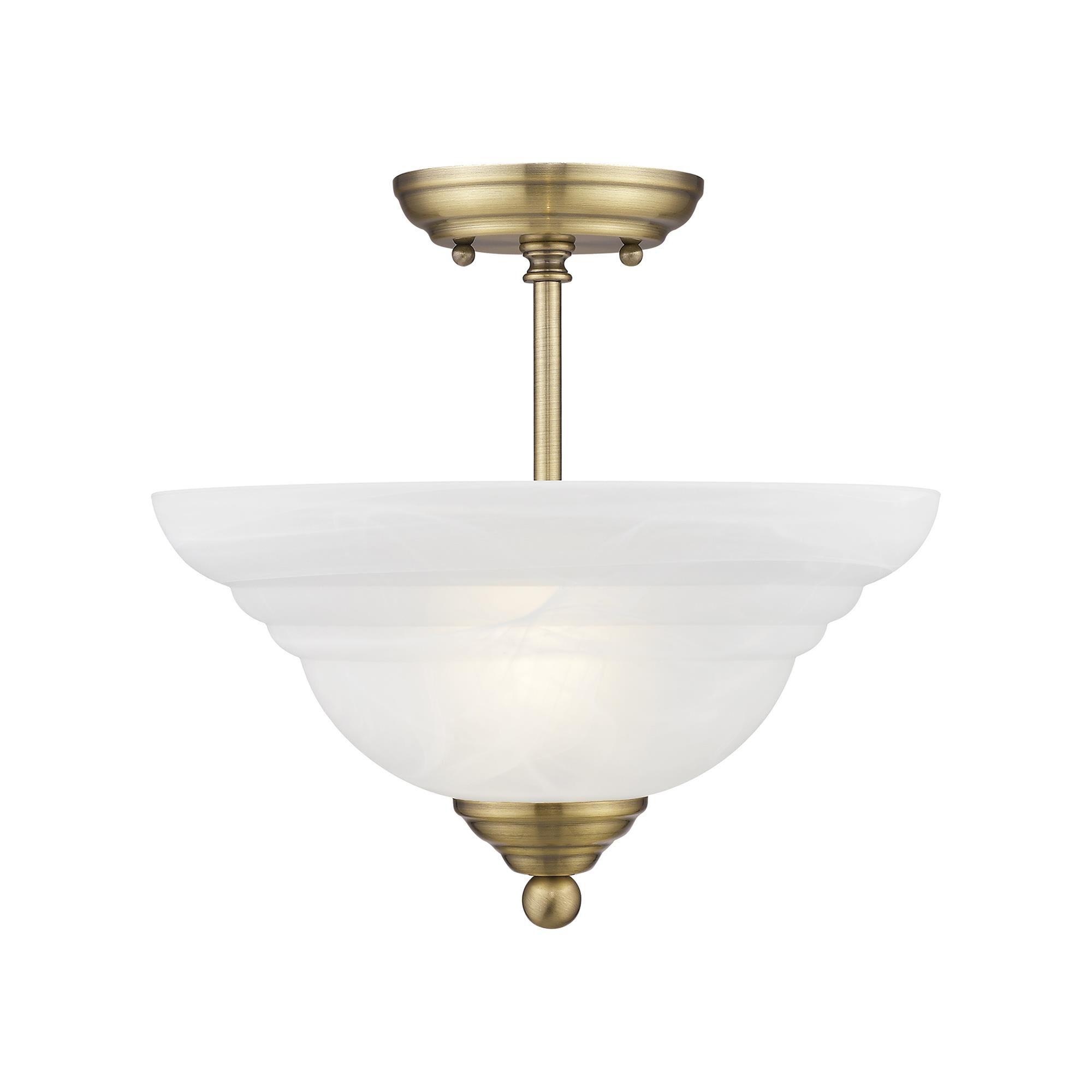 Shown in Antique Brass finish and White Alabaster glass