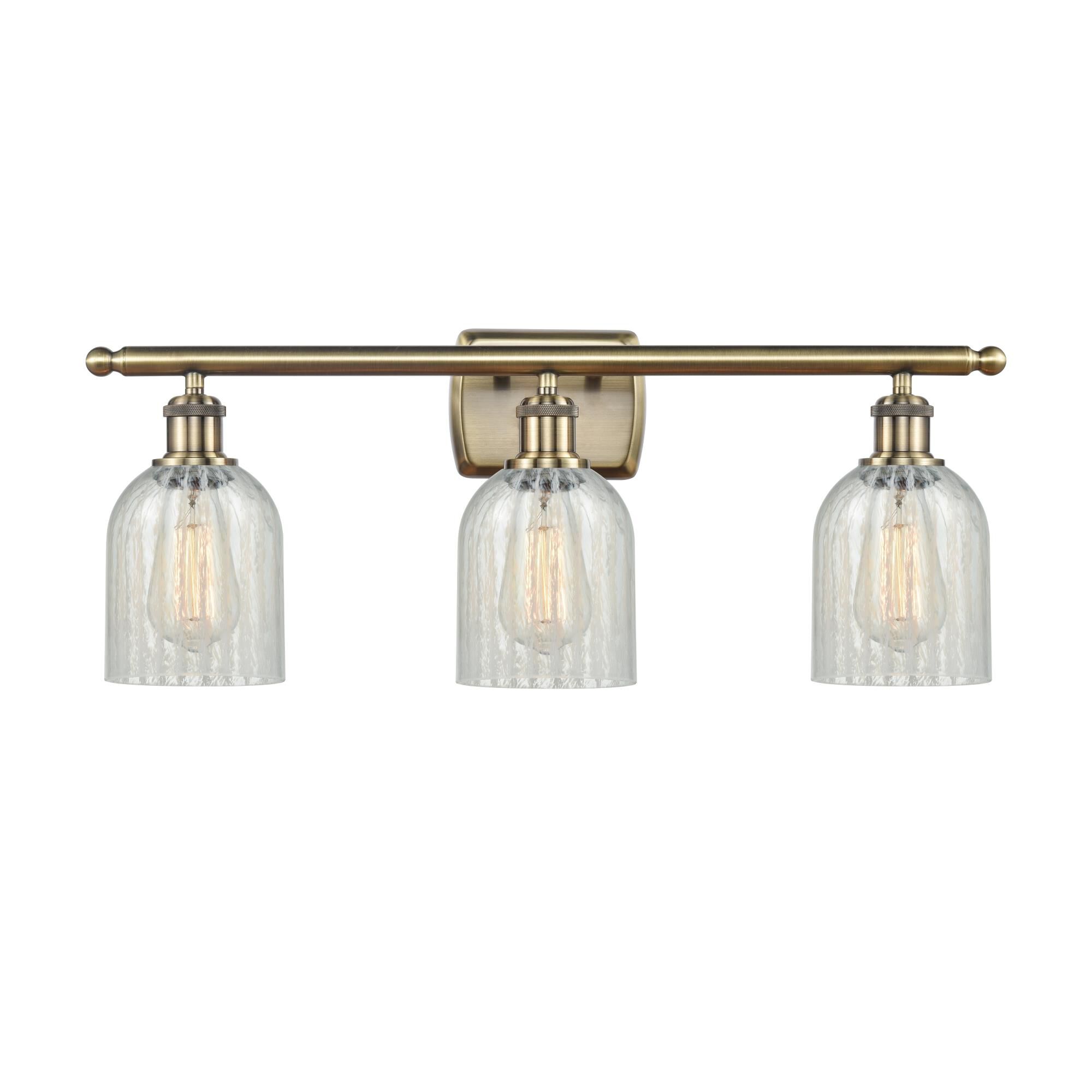 Shown in Antique Brass finish and Bell glass and Glass shade
