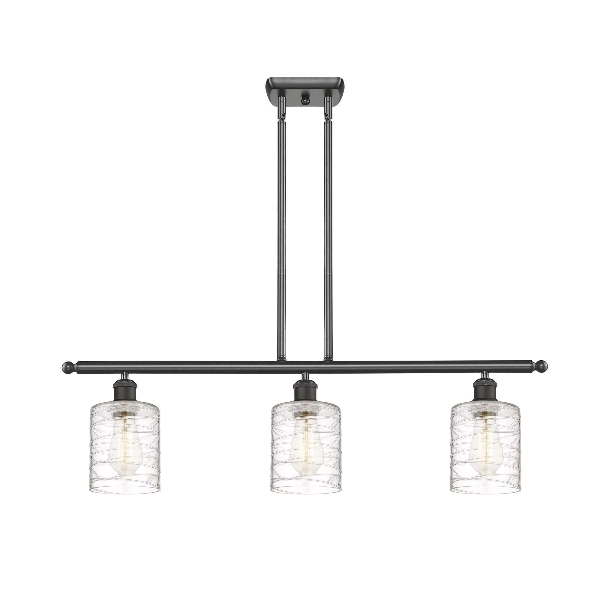 Shown in Oil Rubbed Bronze finish and Deco Swirl Cobbleskill glass