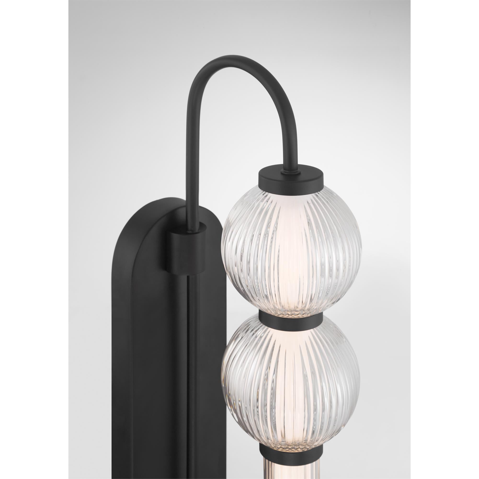 Shown in Dark Matte Black finish and Clear Ribbed glass