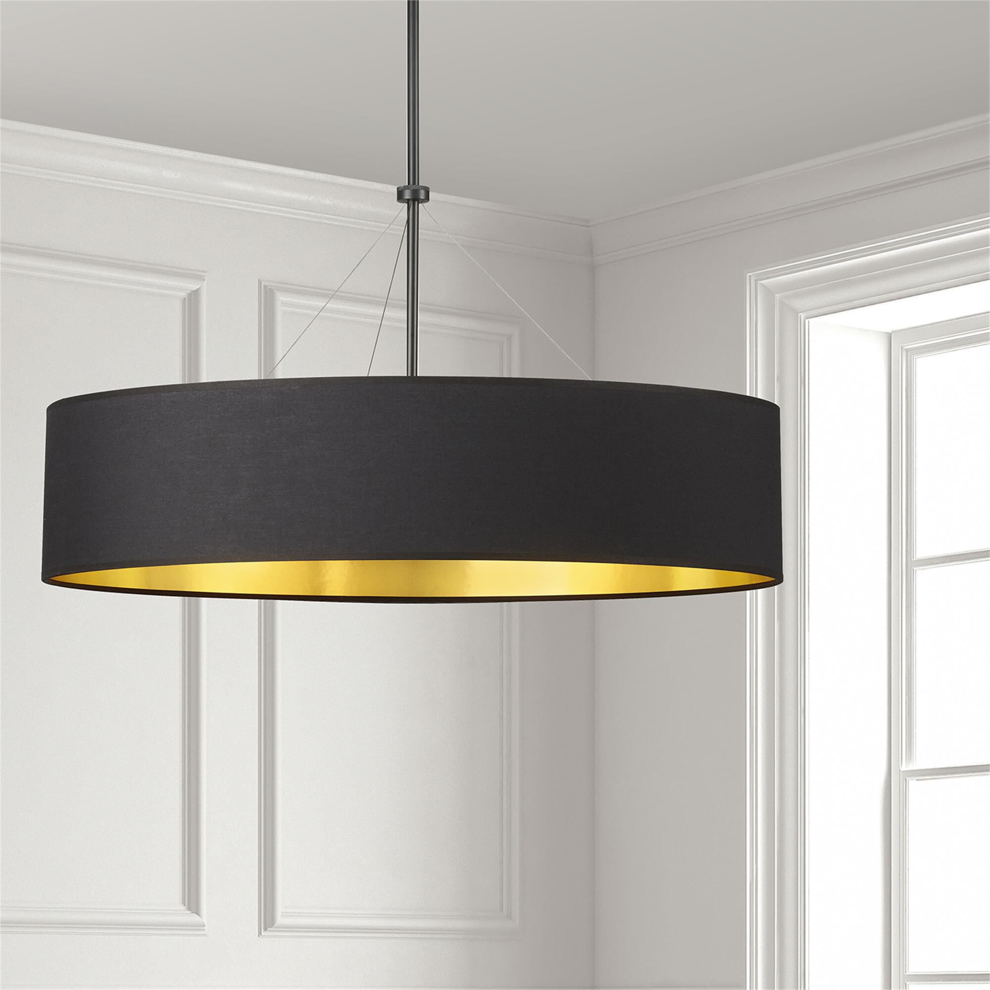 Shown in Black and Gold finish and Black Fabric Drum shade