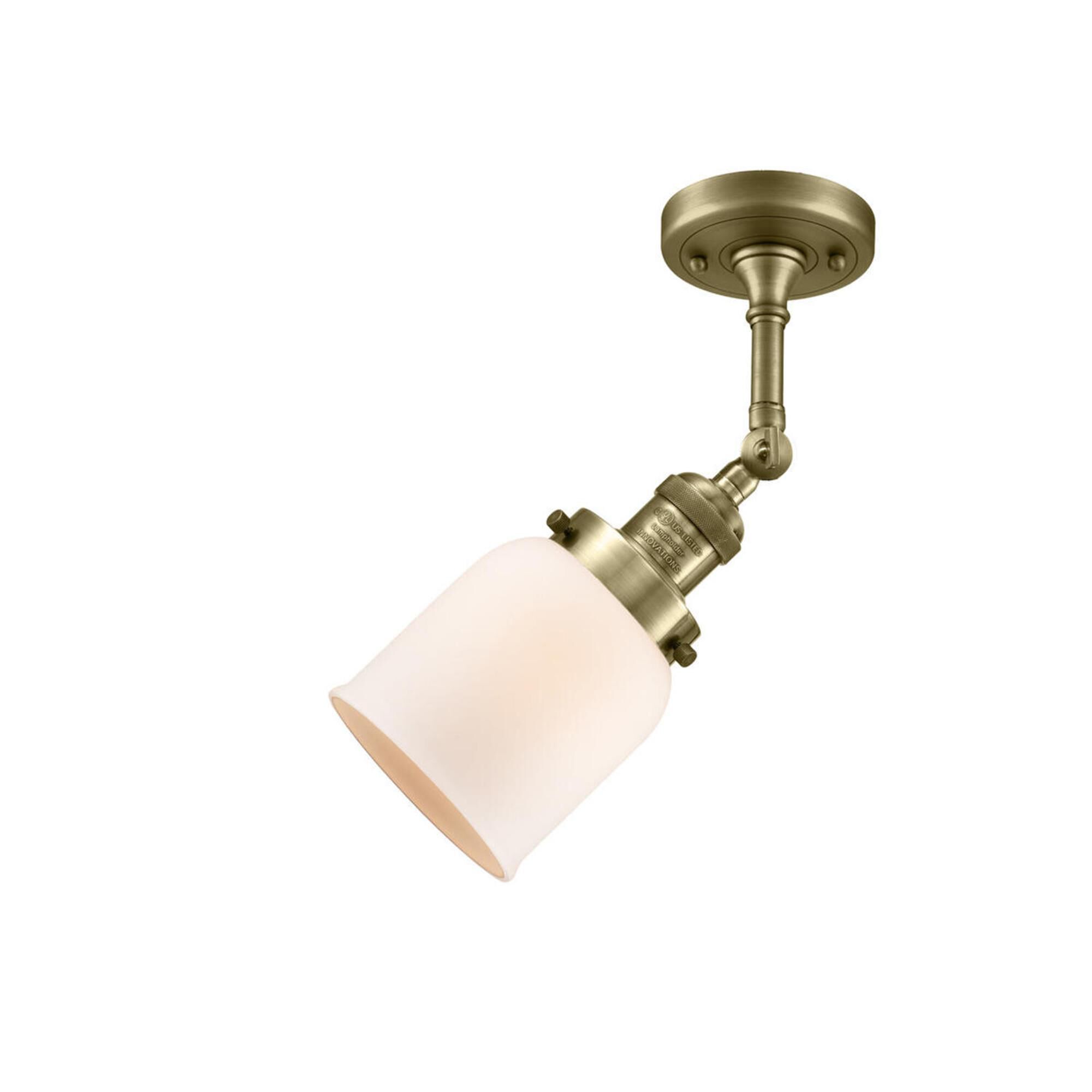 Shown in Antique Brass finish and Frosted glass and None accent