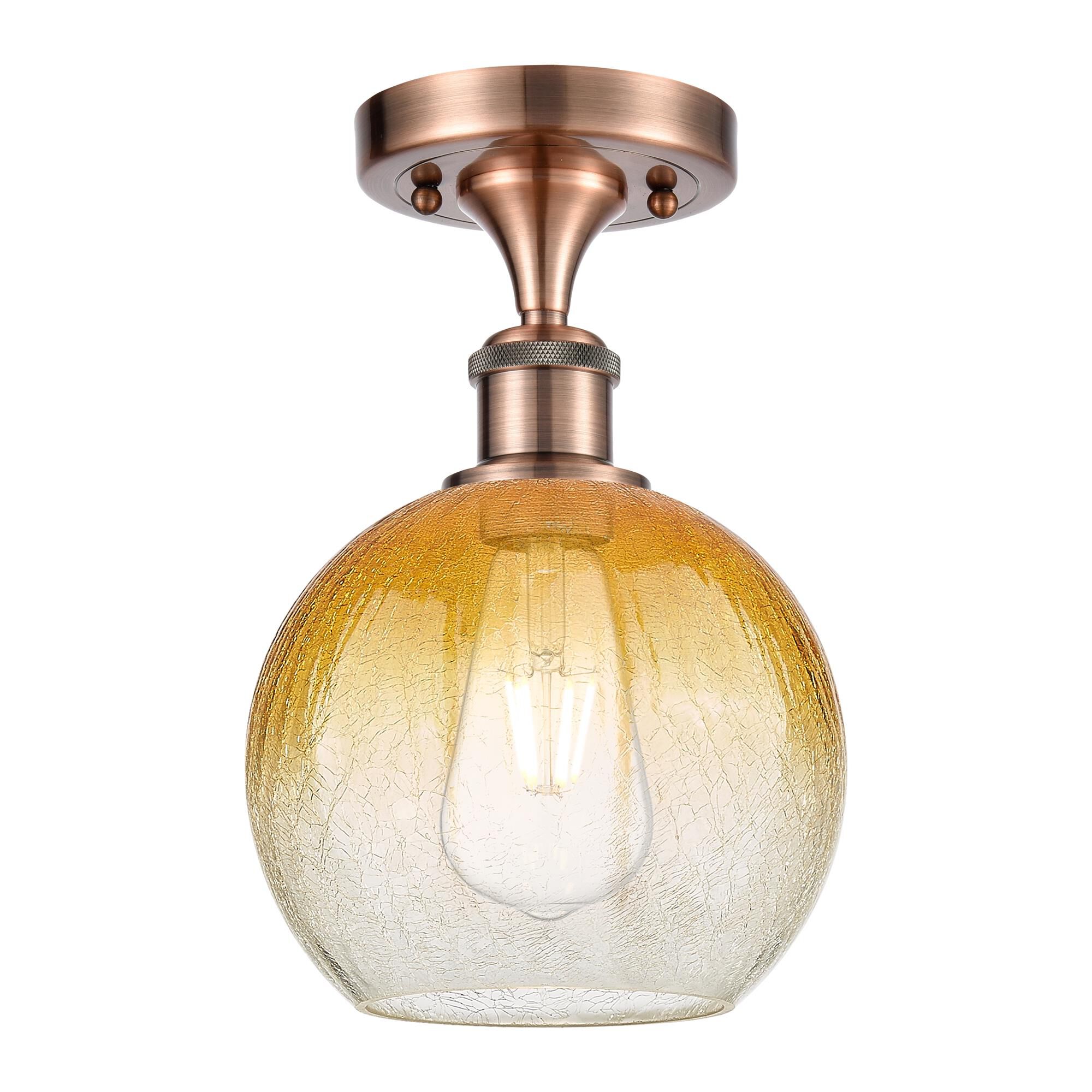 Shown in Antique Copper finish and Amber glass