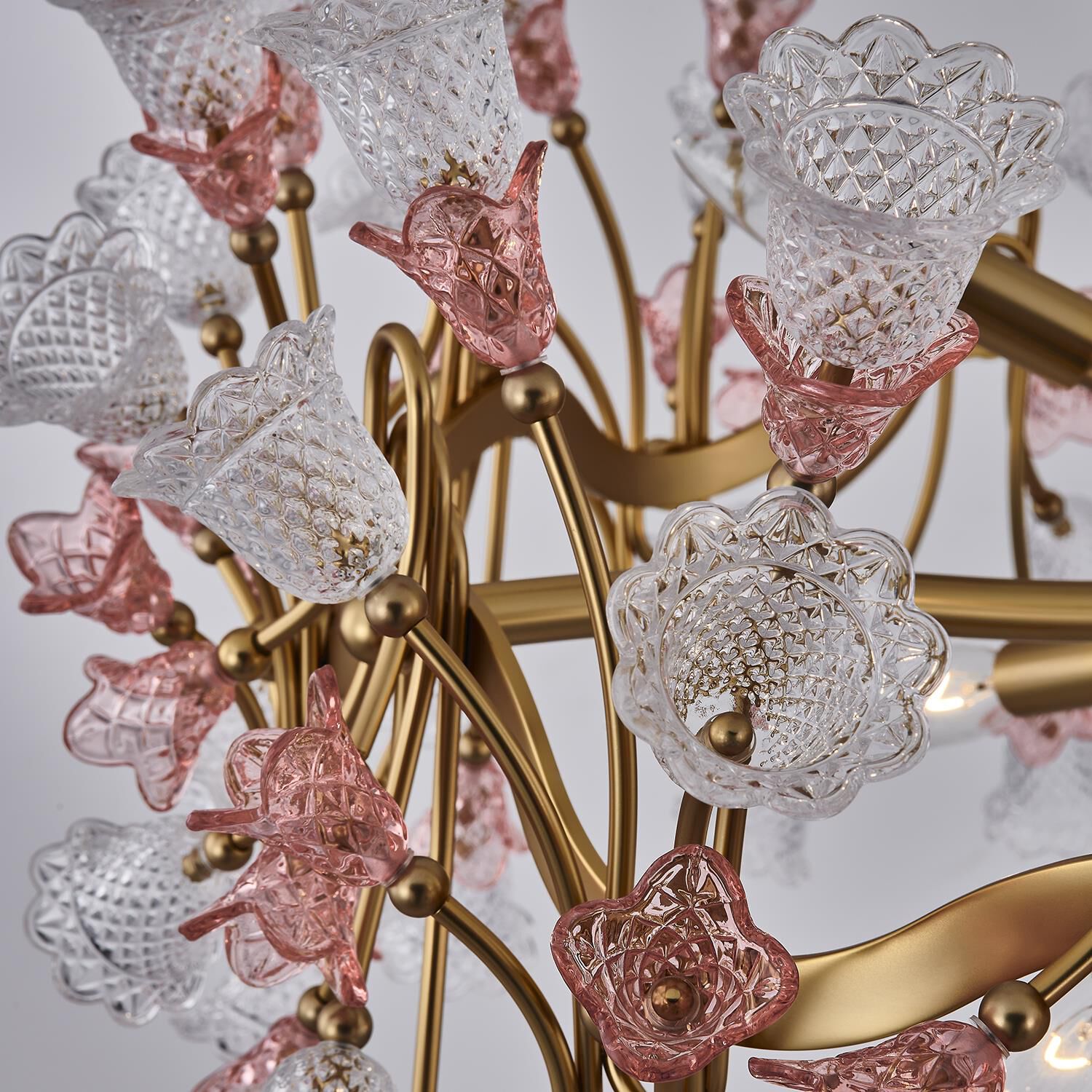 Shown in Antique Brass finish and Vintage Rose crystal