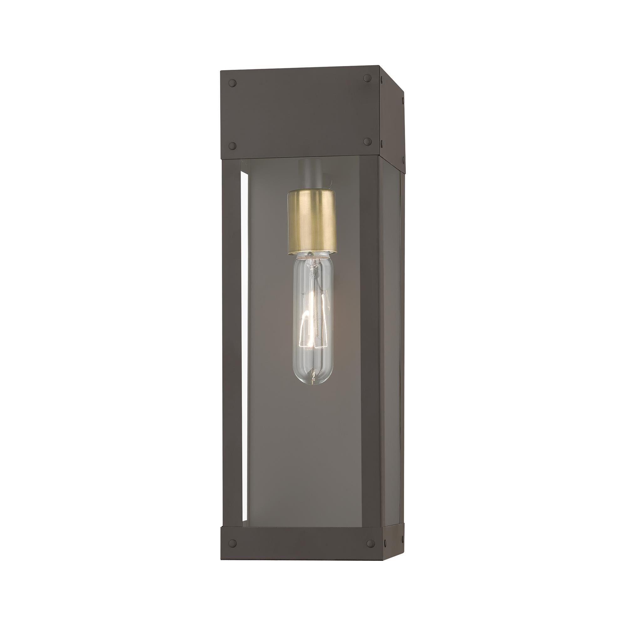 Shown in Bronze with Antique Brass Candle finish and Clear glass