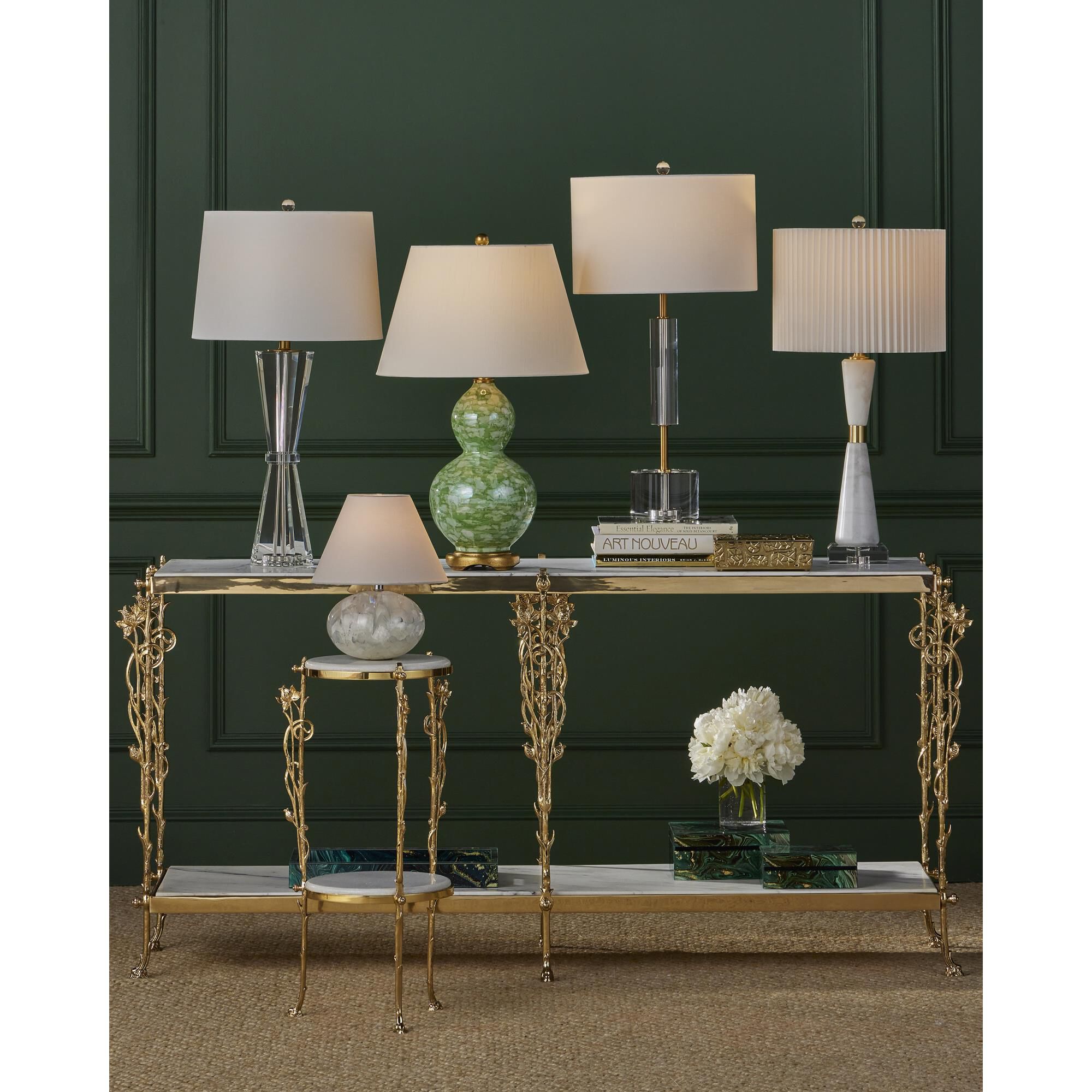 Shown in Clear, Antique Brass finish and Off-White Fine Linen shade