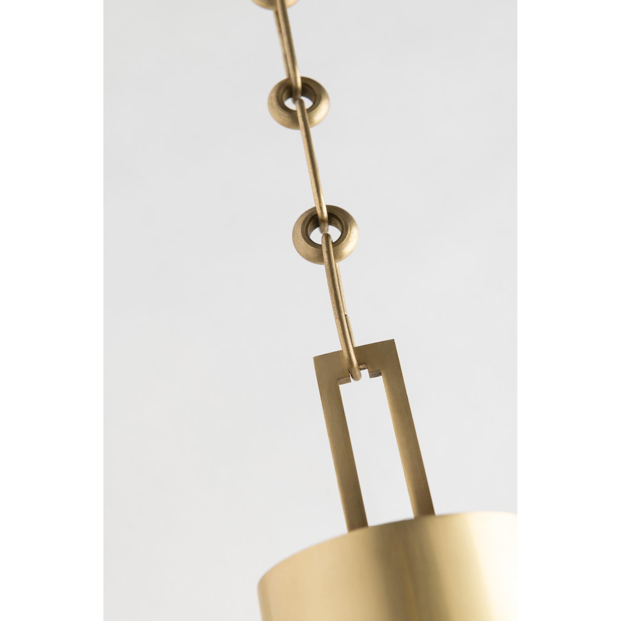 Shown in Aged Brass finish and Clear glass