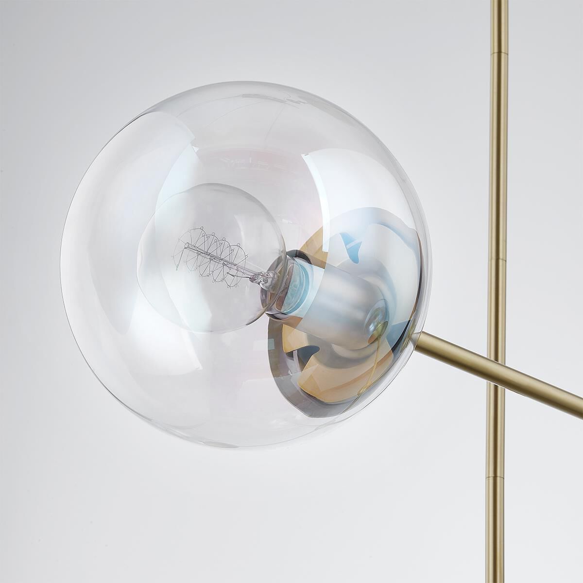 Shown in Aged Brass finish and Clear Plated Iridescent glass