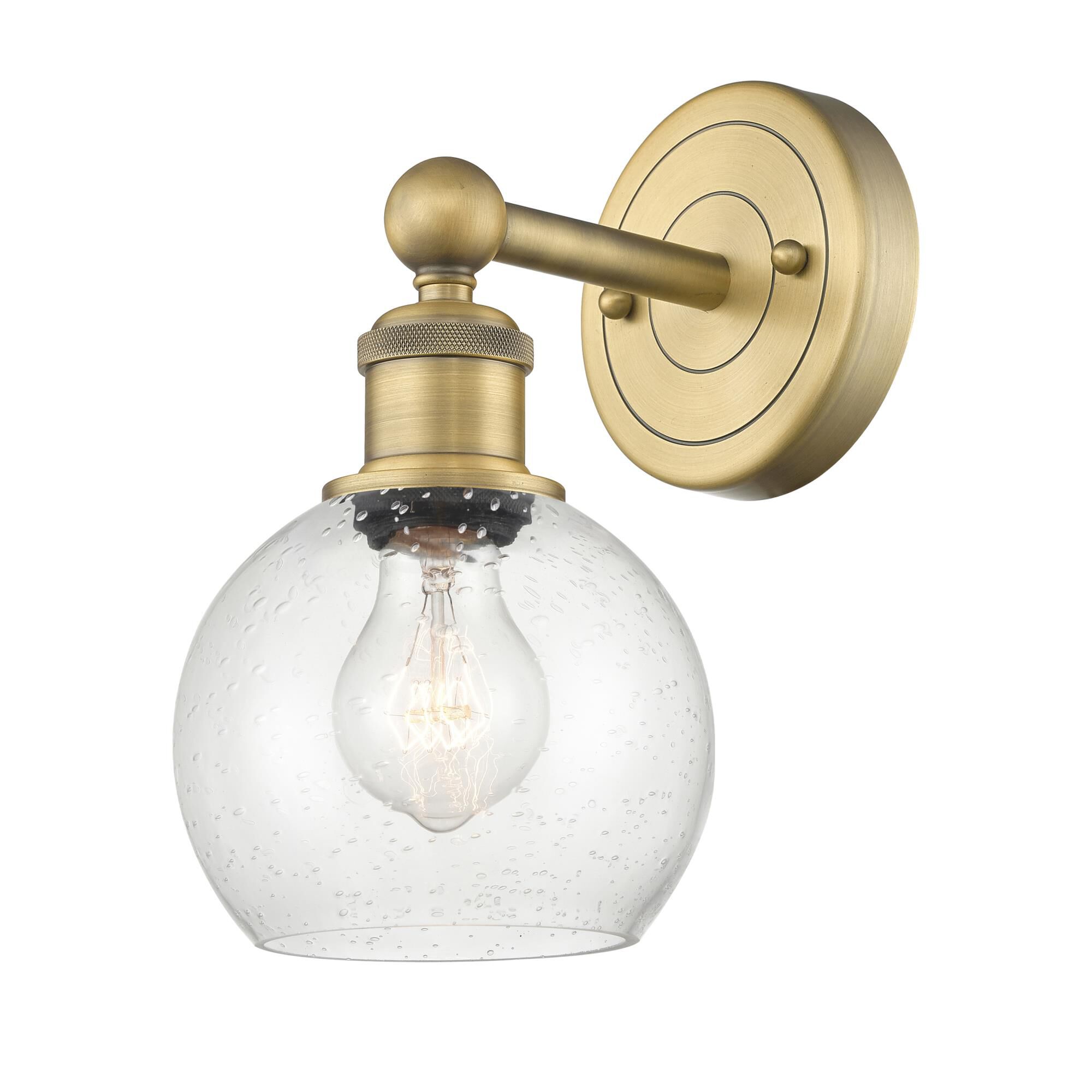 Shown in Brushed Brass finish and Seedy glass