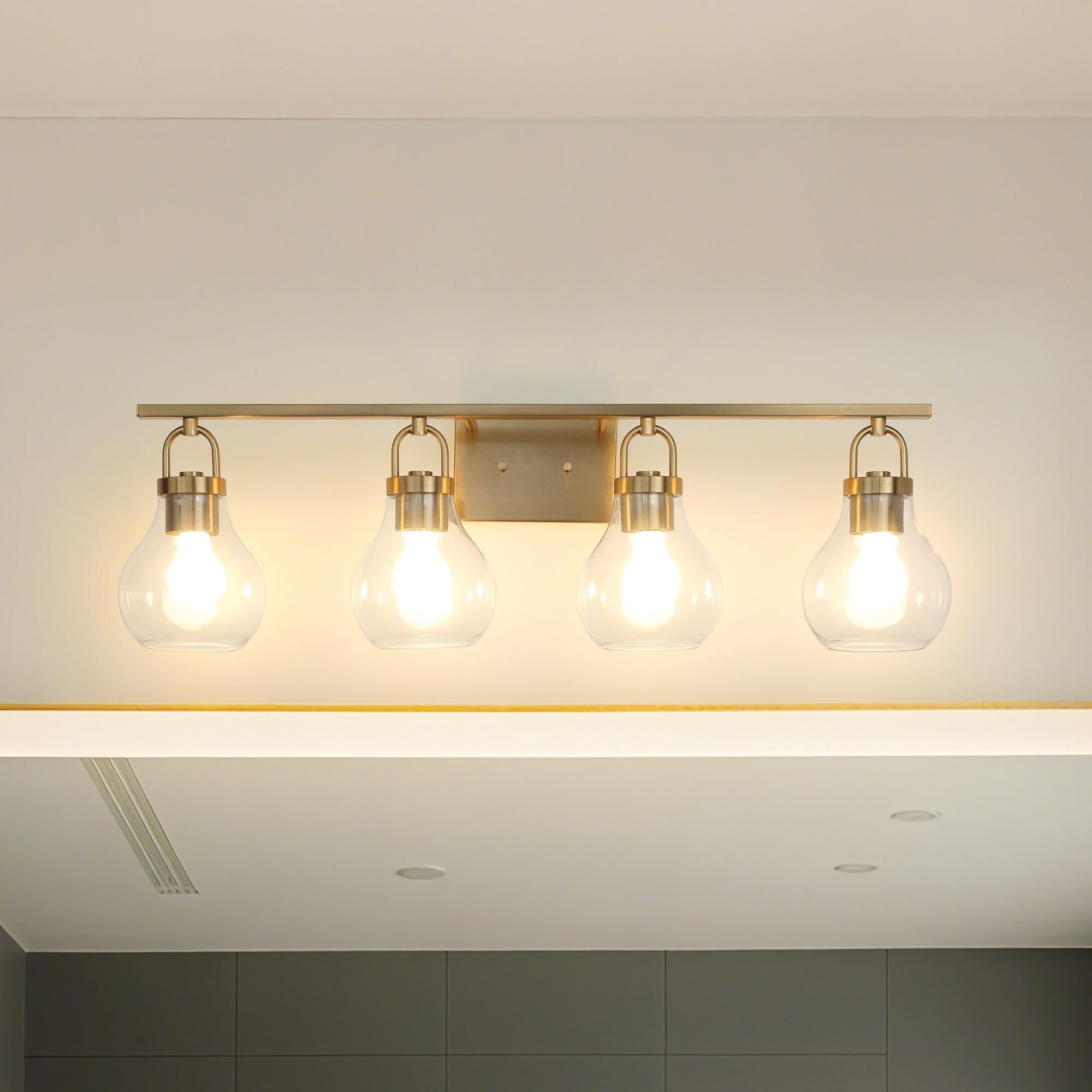 Shown in Champagne Gold finish and Clear glass