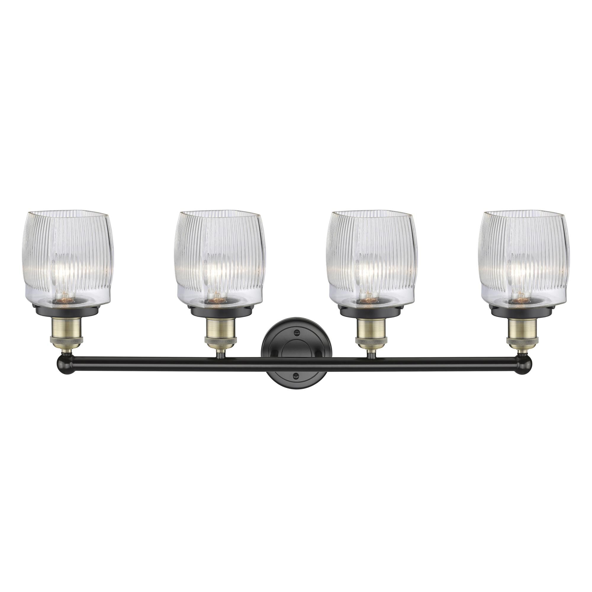 Shown in Black Antique Brass finish and Clear Halophane glass