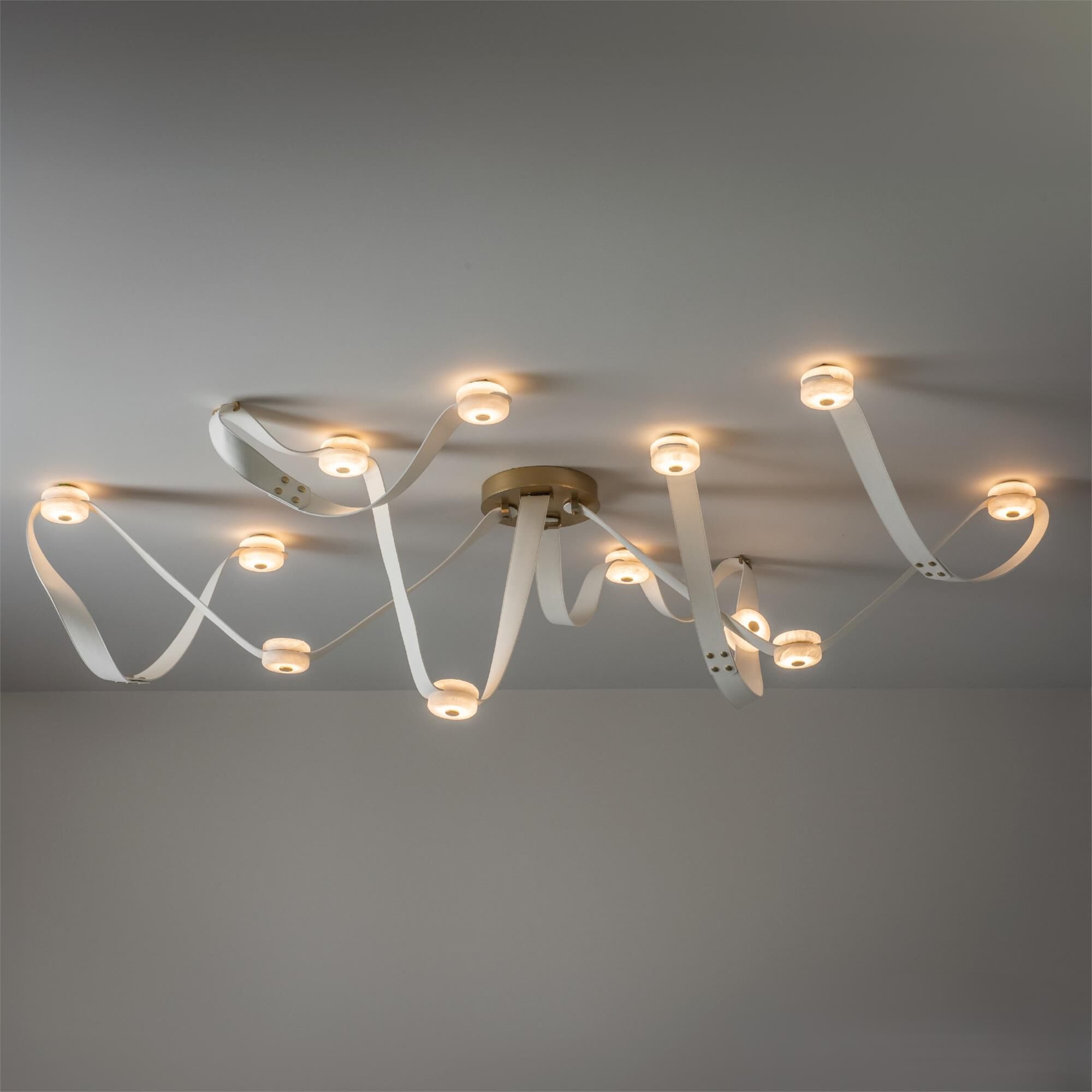 Shown in Modern Brass finish and White Leather accent