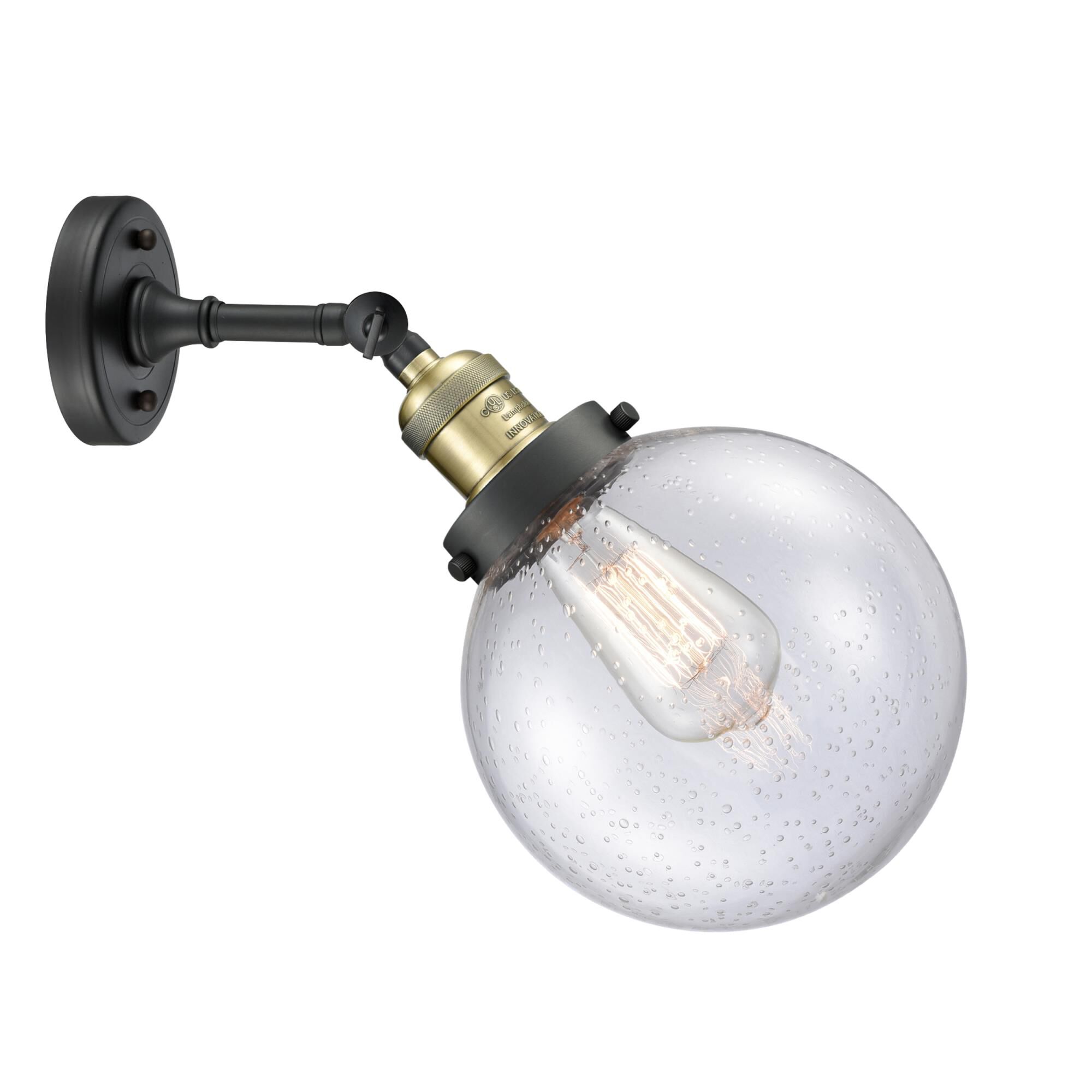 Shown in Black Antique Brass finish and Seedy glass and No Accent accent