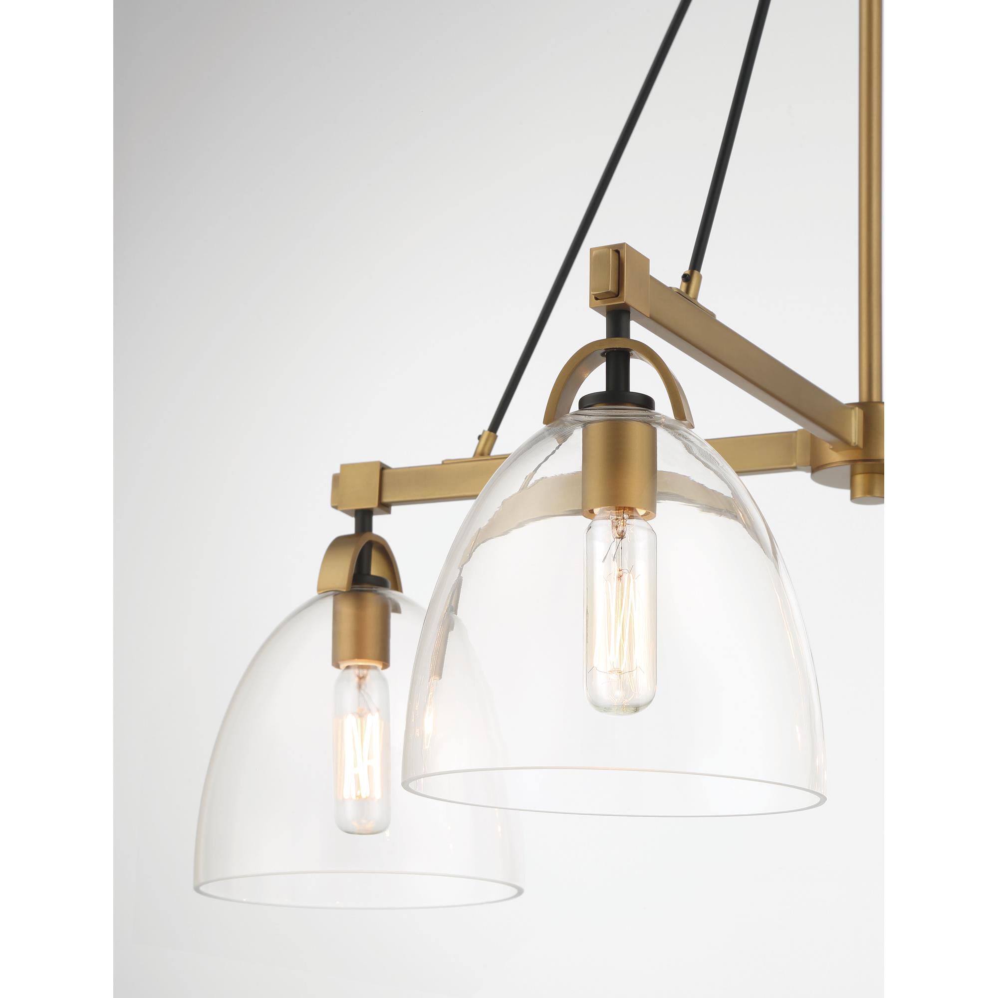 Shown in Legacy Brass & Matte Coal finish and Clear glass and Glass shade