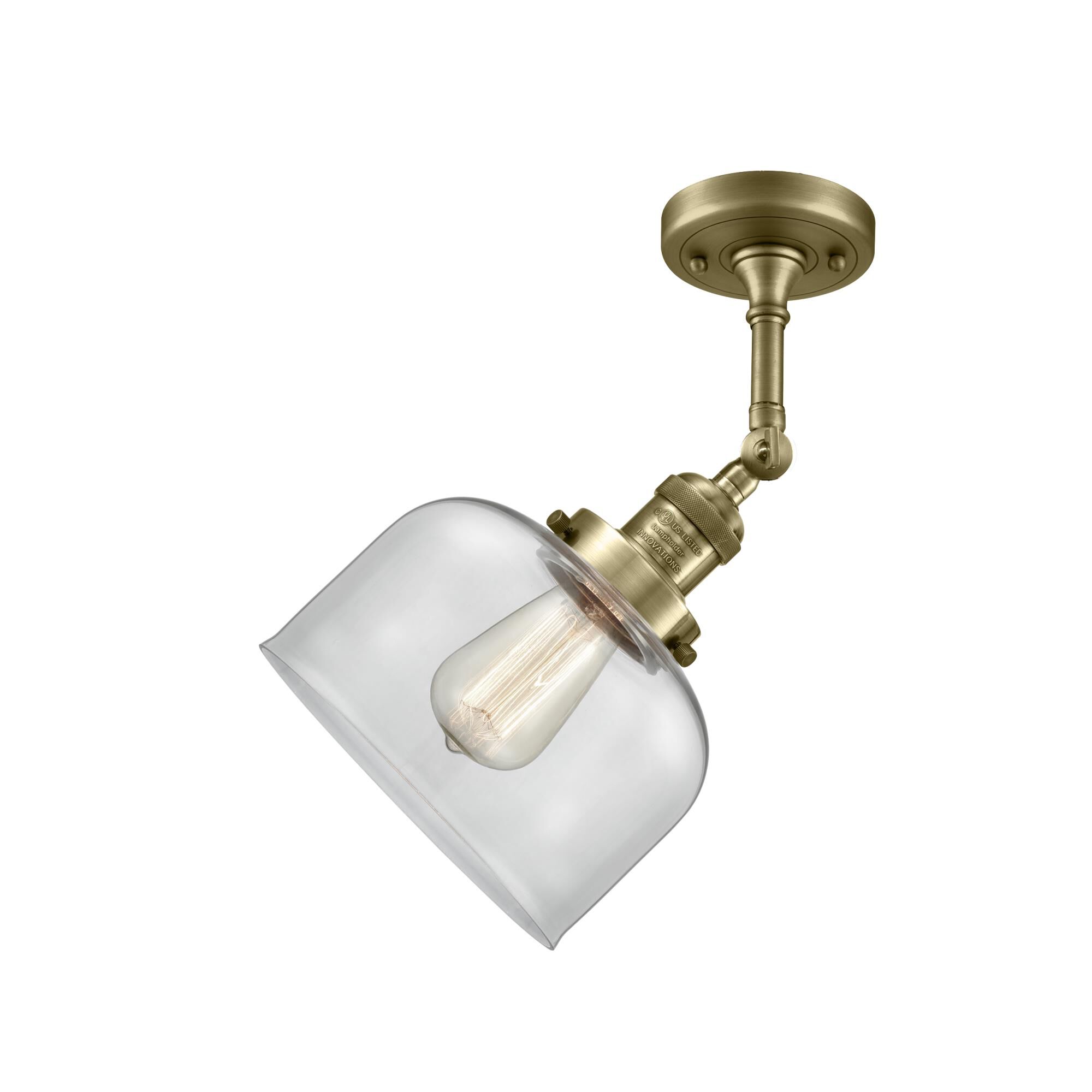 Shown in Antique Brass finish and Clear glass