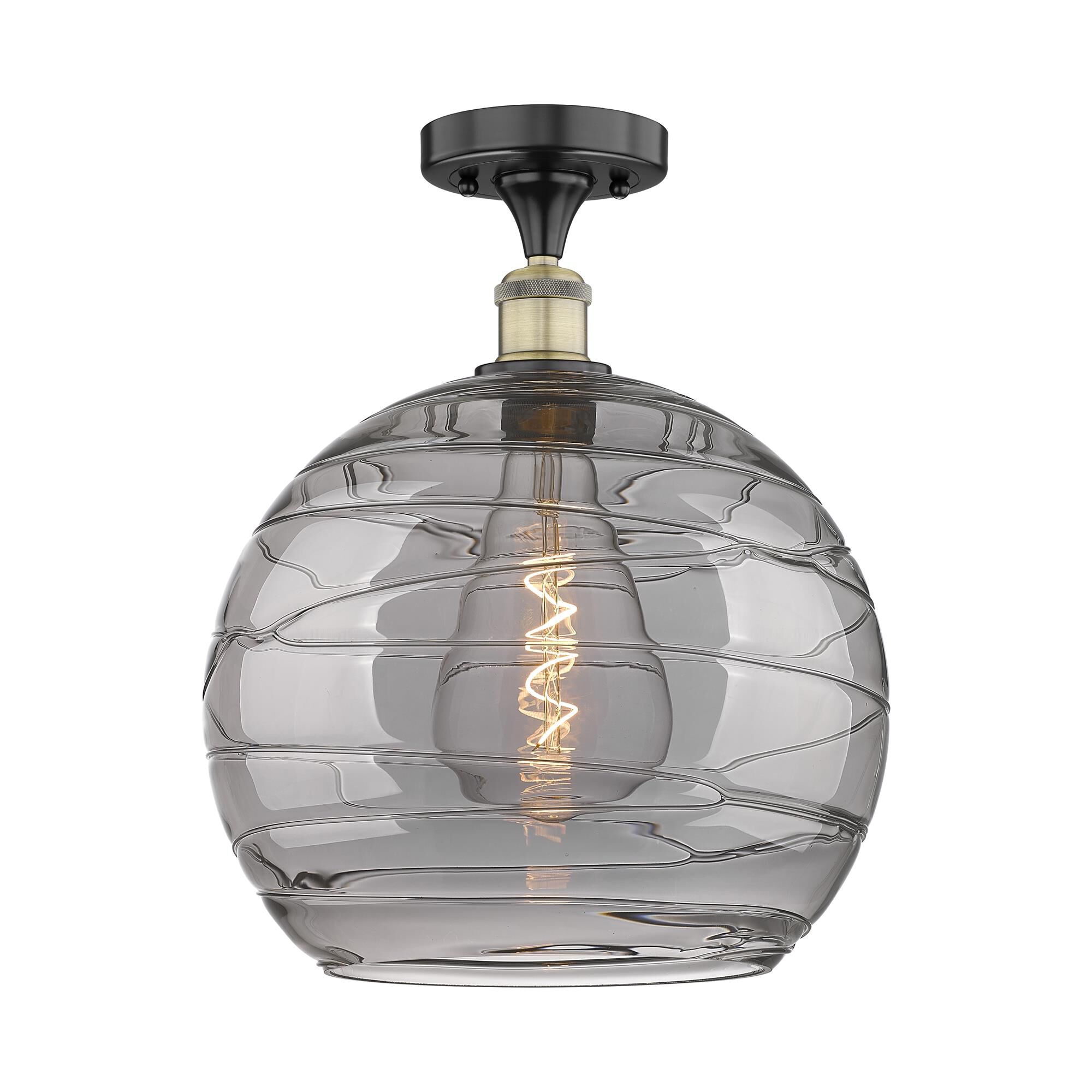 Shown in Black Antique Brass finish and Light Smoke Deco Swirl glass