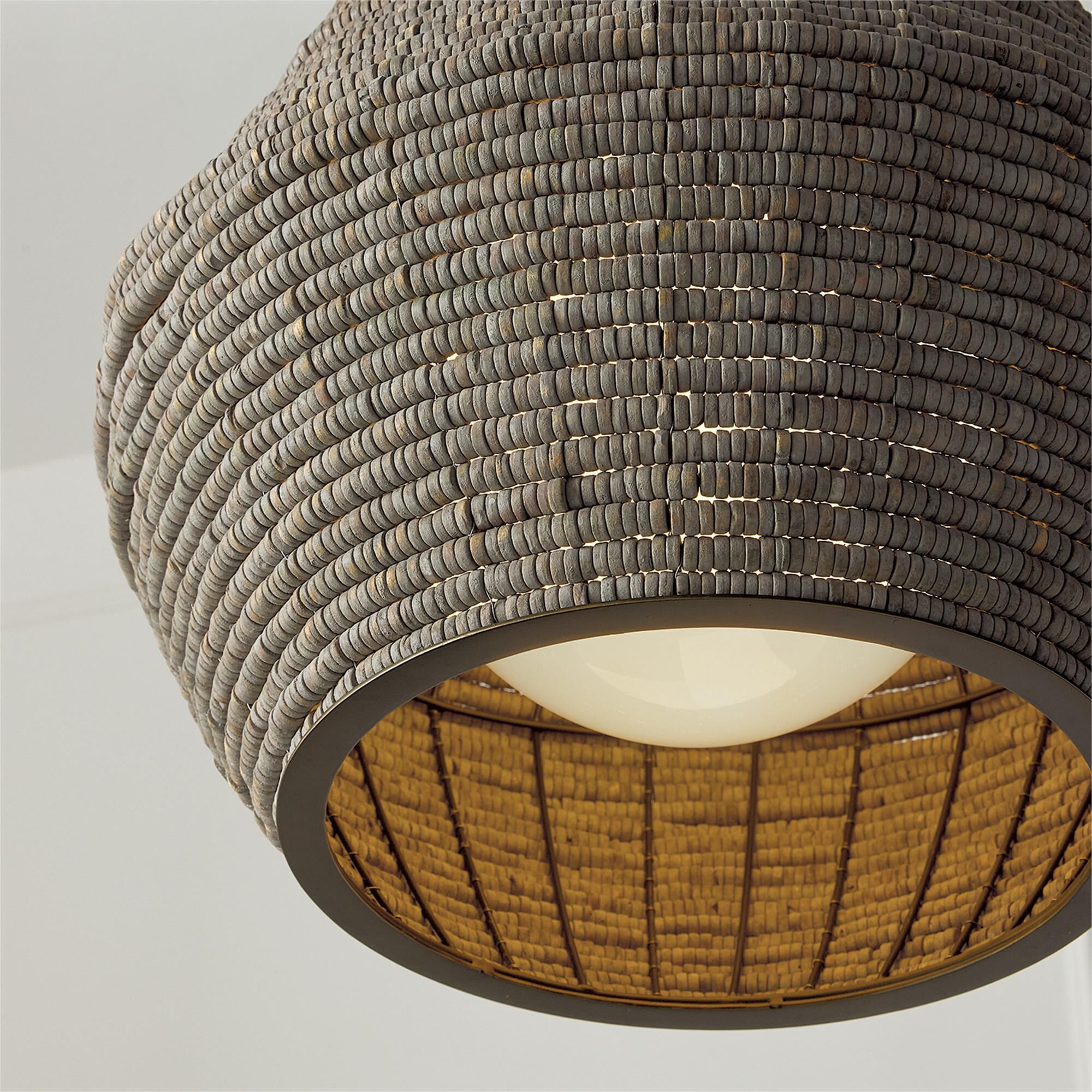 Shown in Aegean Grey And Dark Brass finish and White  Globe glass