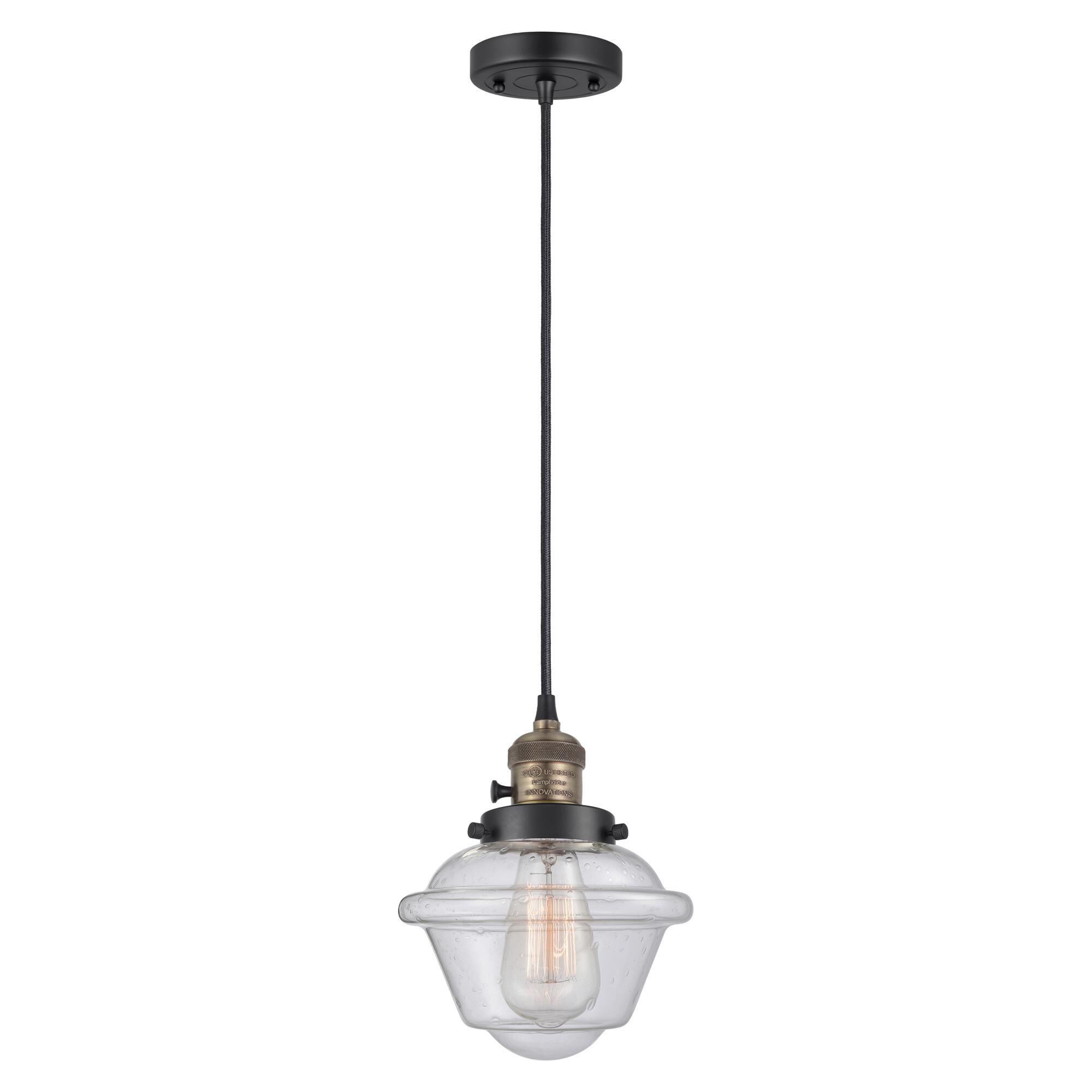 Shown in Black Antique Brass finish and Seedy glass