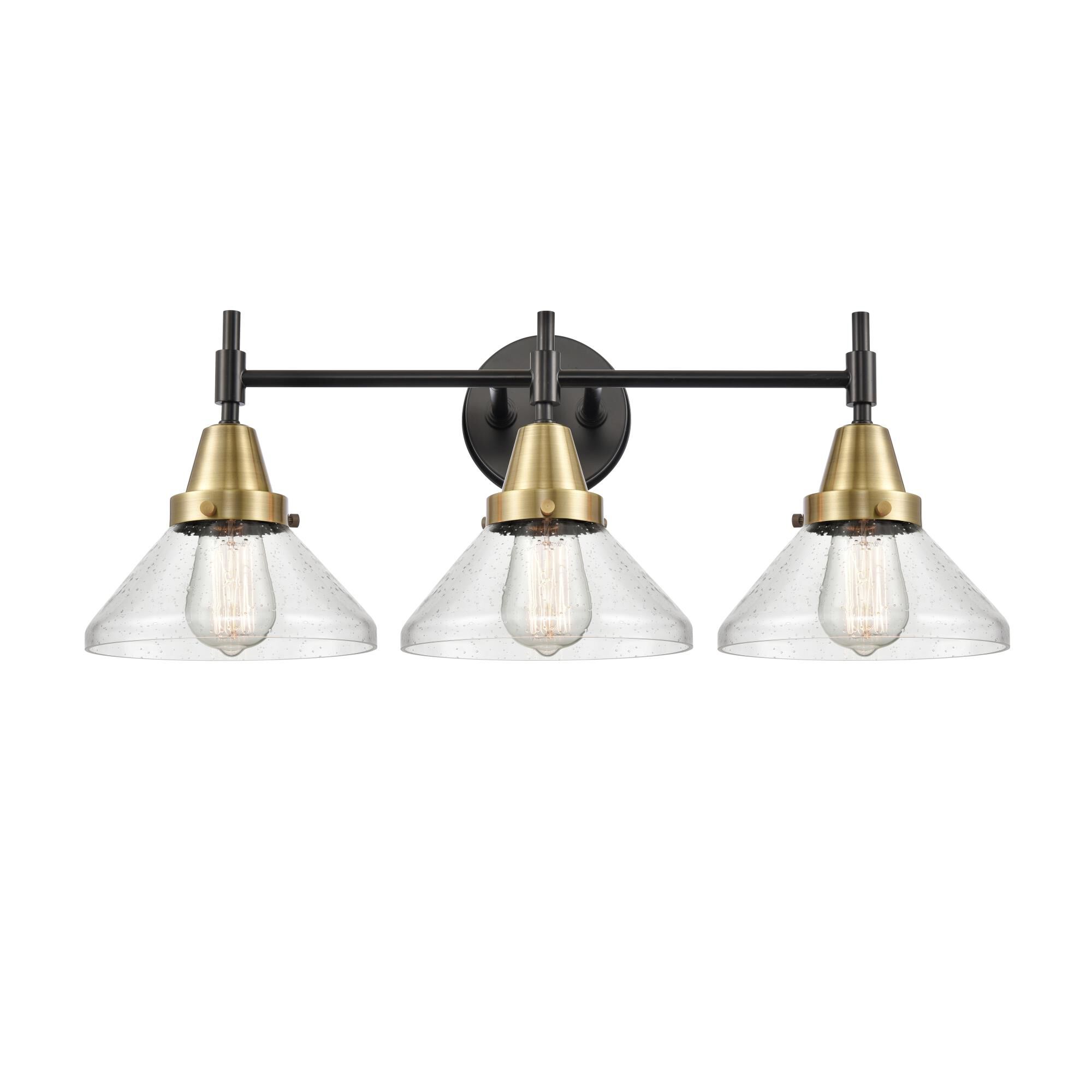 Shown in Black Antique Brass finish and Seedy Caden glass