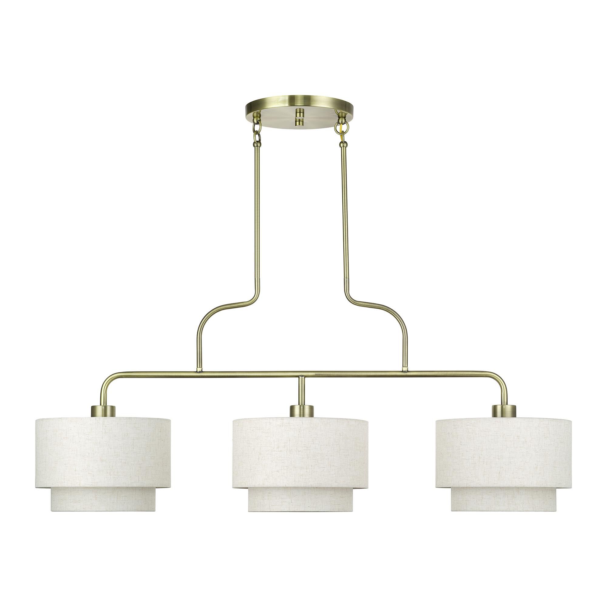 Shown in Antique Brass finish and Hand Crafted Oatmeal Color Fabric with White Color Inside shade