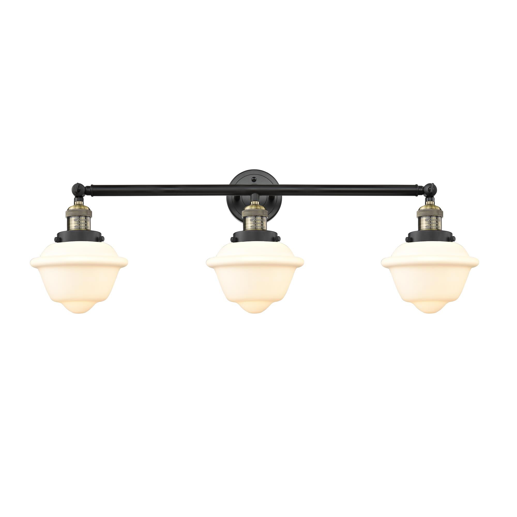 Shown in Black Antique Brass finish and Matte White Cased Small Oxford glass