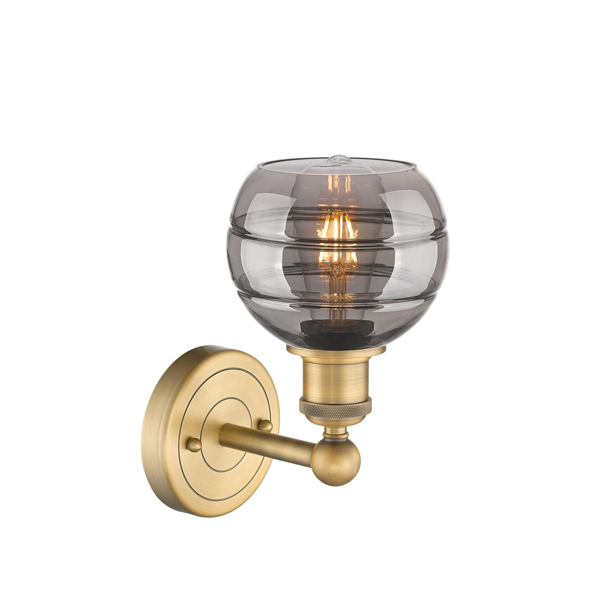 Shown in Brushed Brass finish and Light Smoke glass