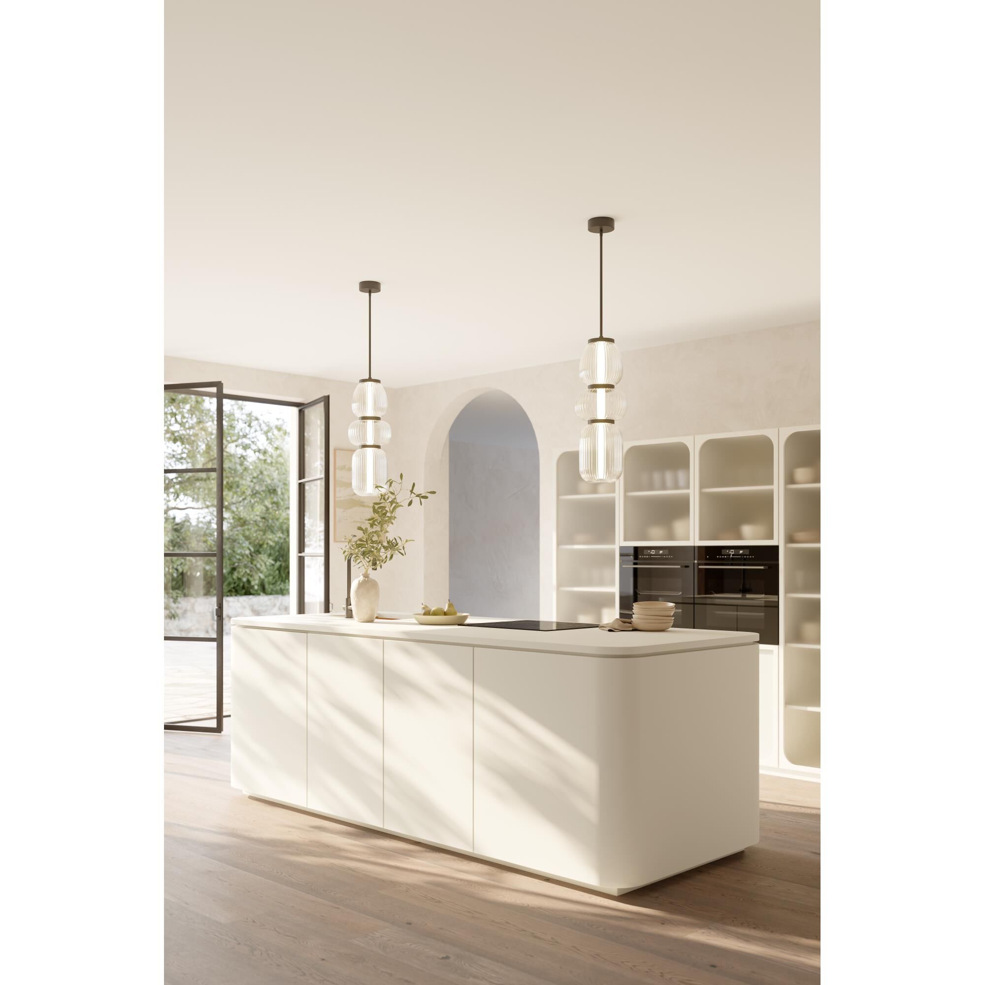 Shown in Legacy Brass finish and Clear Ribbed glass