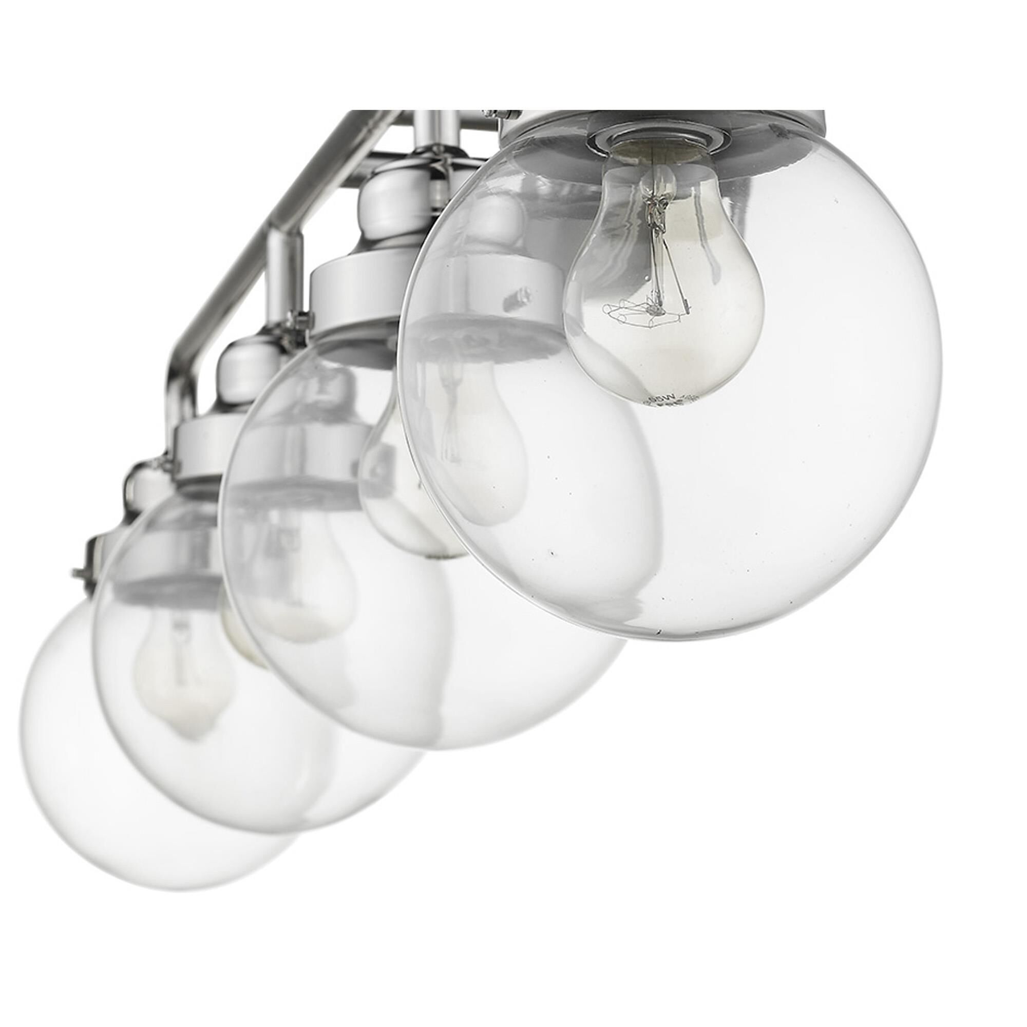 Shown in Polished Nickel finish and Clear glass and Clear, Glass Globes shade