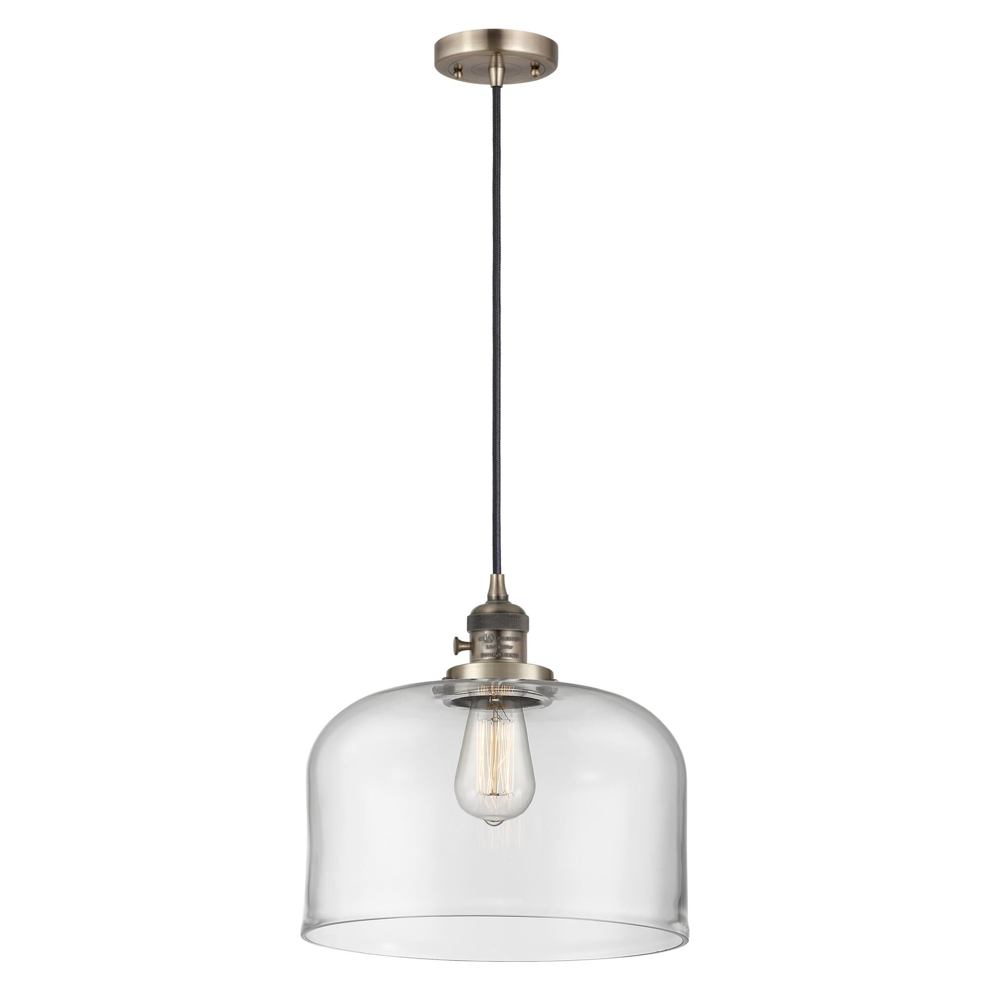 Shown in Antique Brass finish and Clear glass