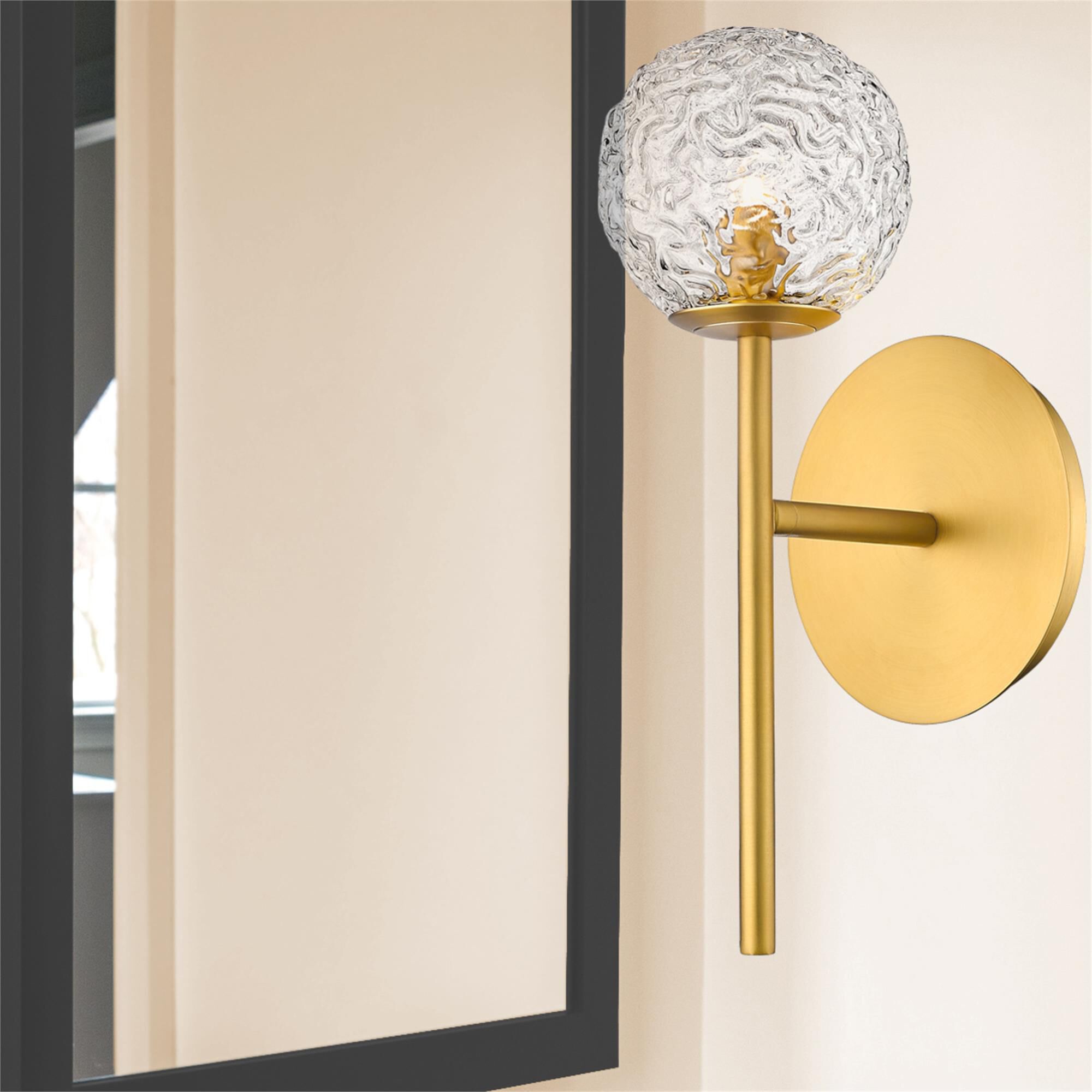 Shown in Brushed Brass finish and Clear glass