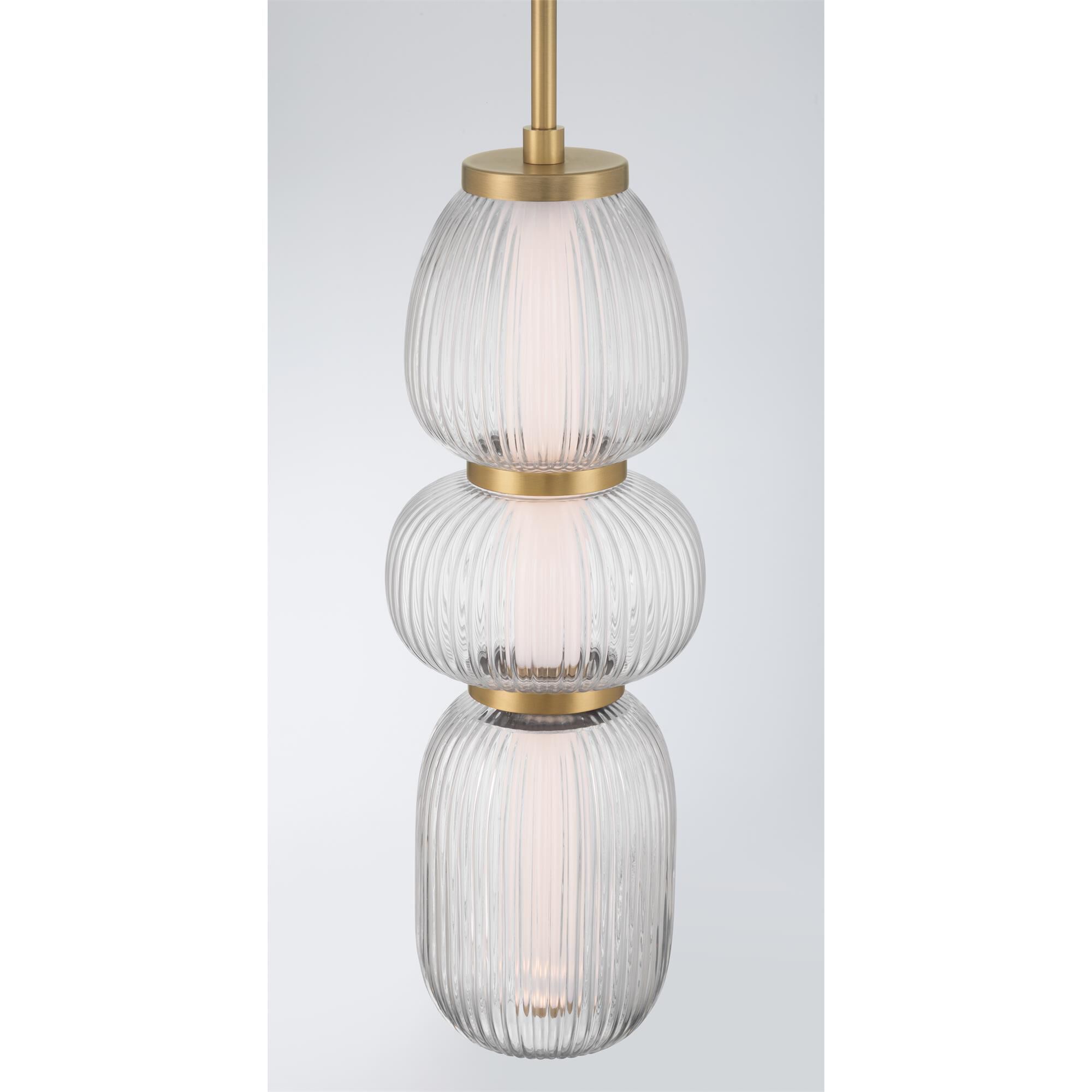 Shown in Legacy Brass finish and Clear Ribbed glass